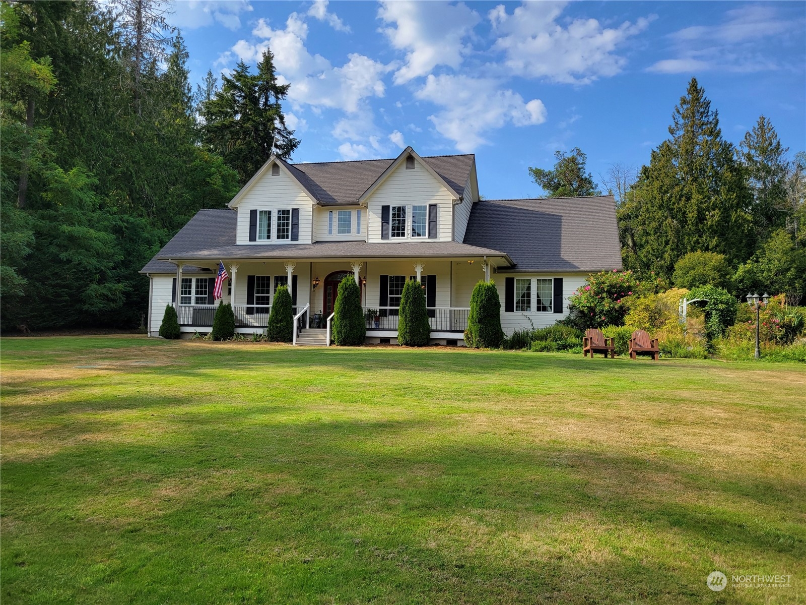 a view of a house with a big yard