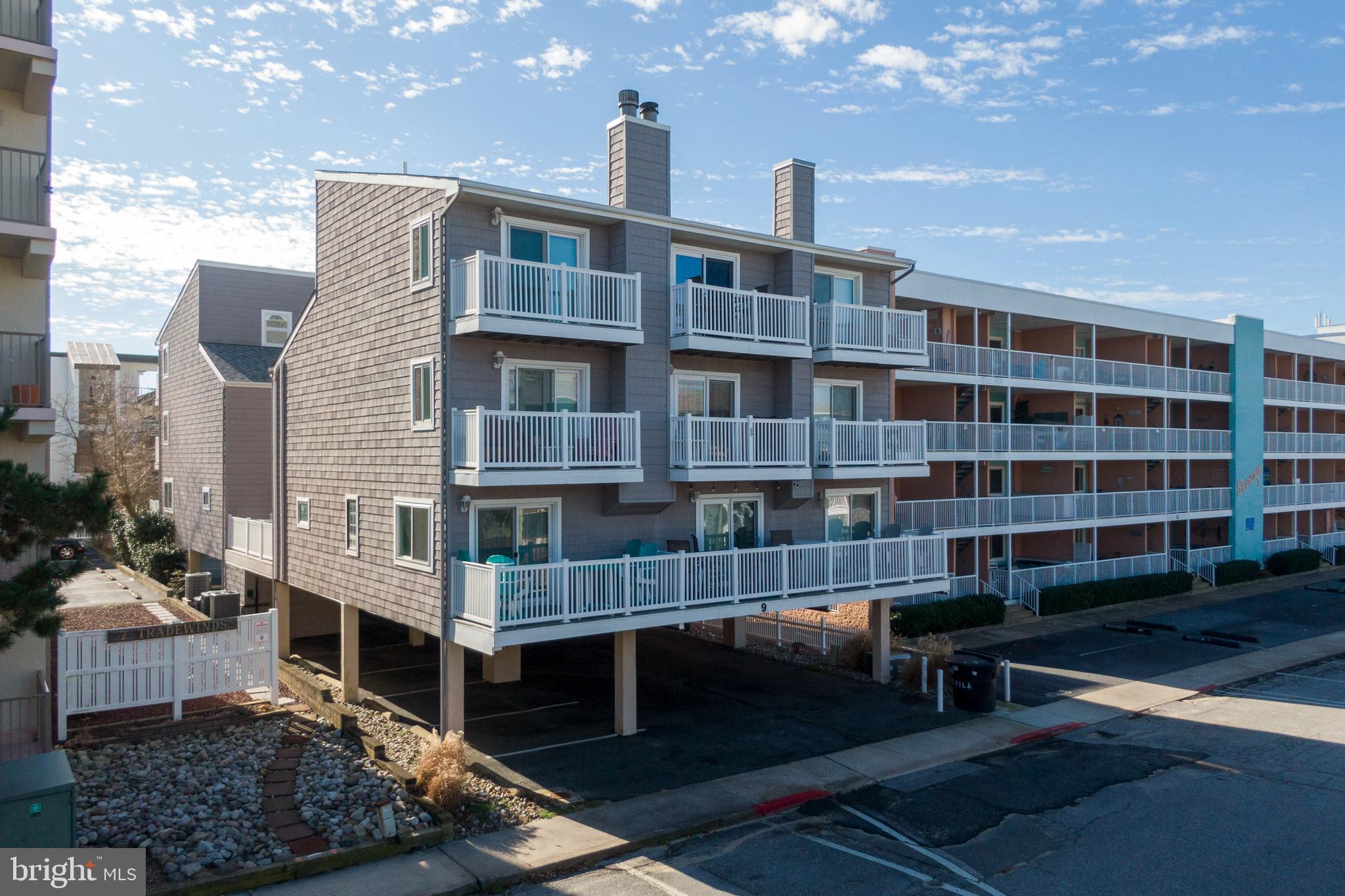 a view of a building with sitting area