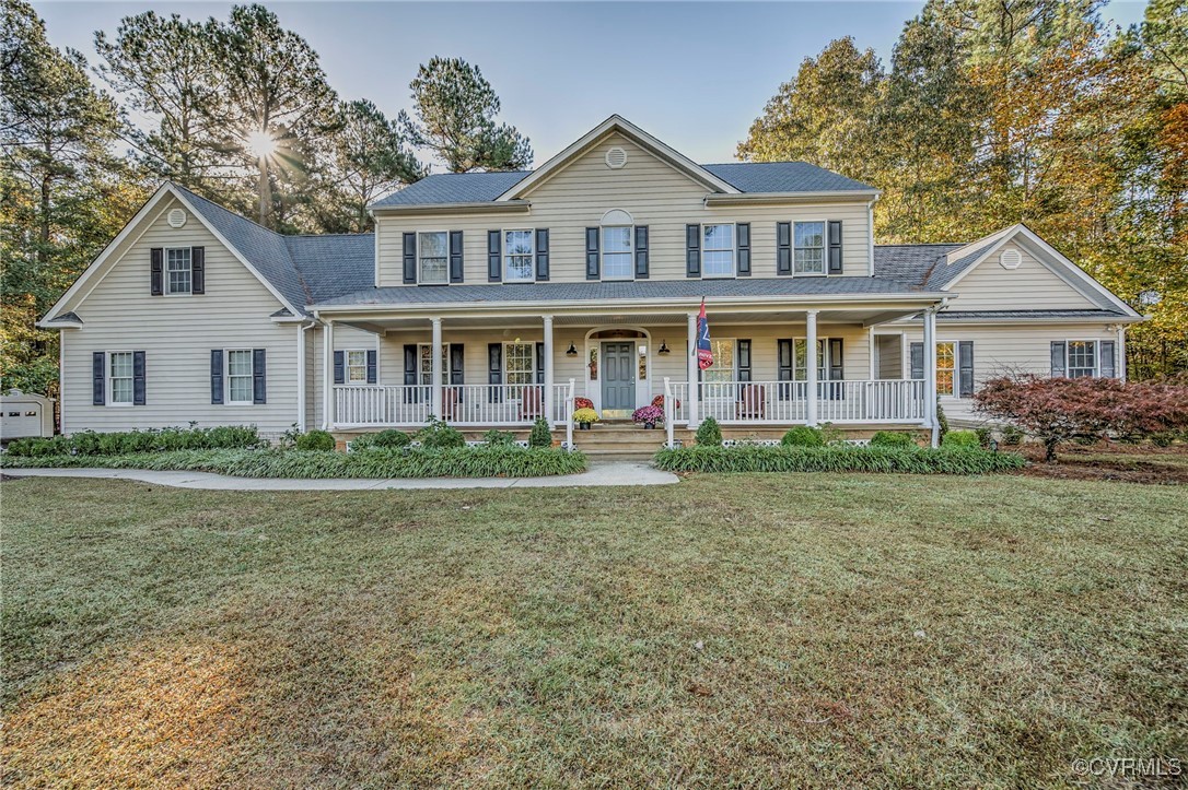 front view of a house with a yard