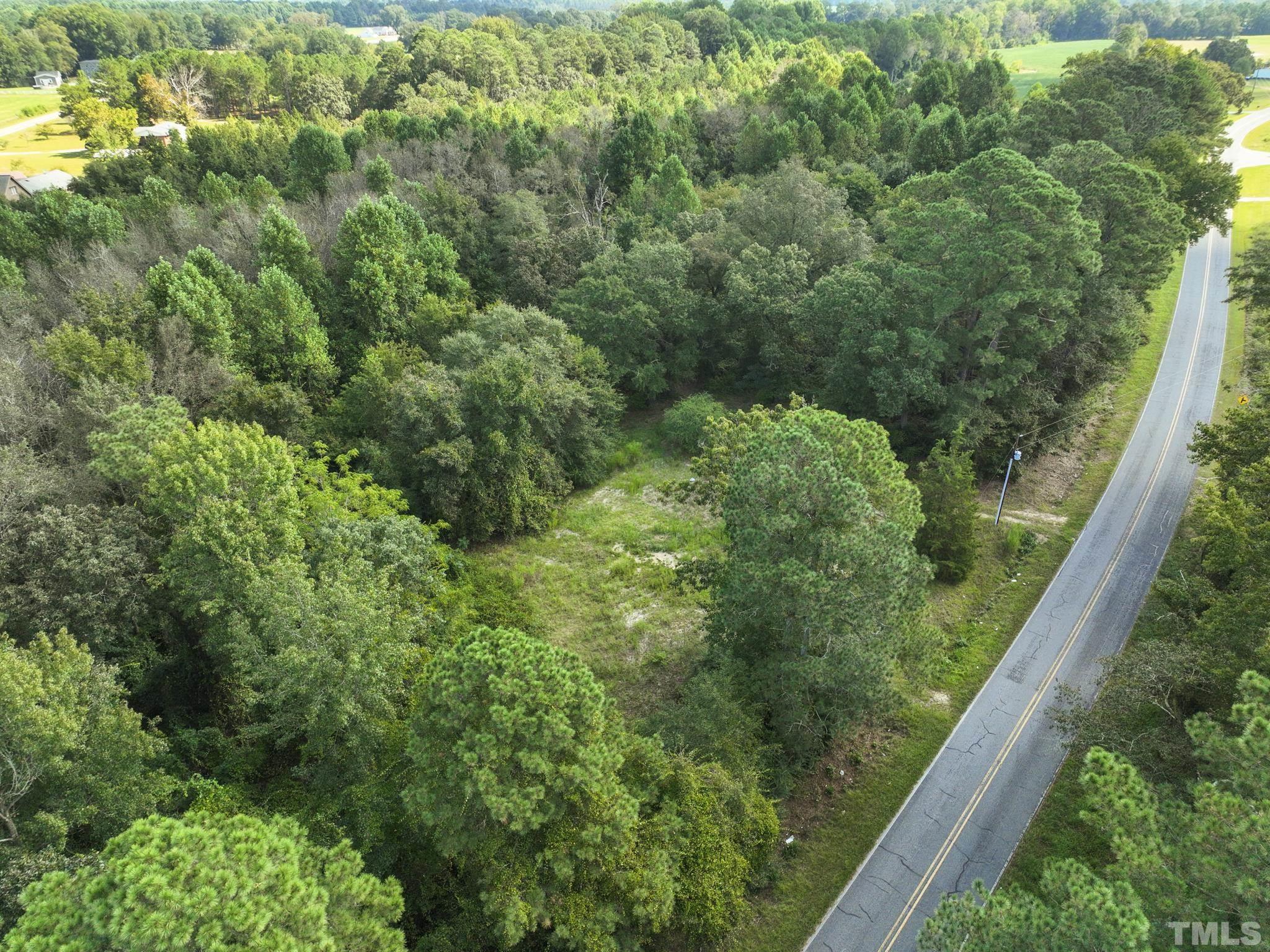 a view of a forest from a balcony