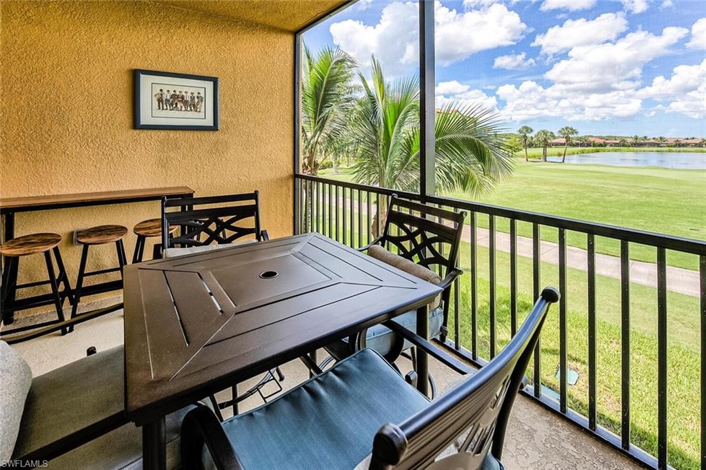 a view of a balcony with chairs