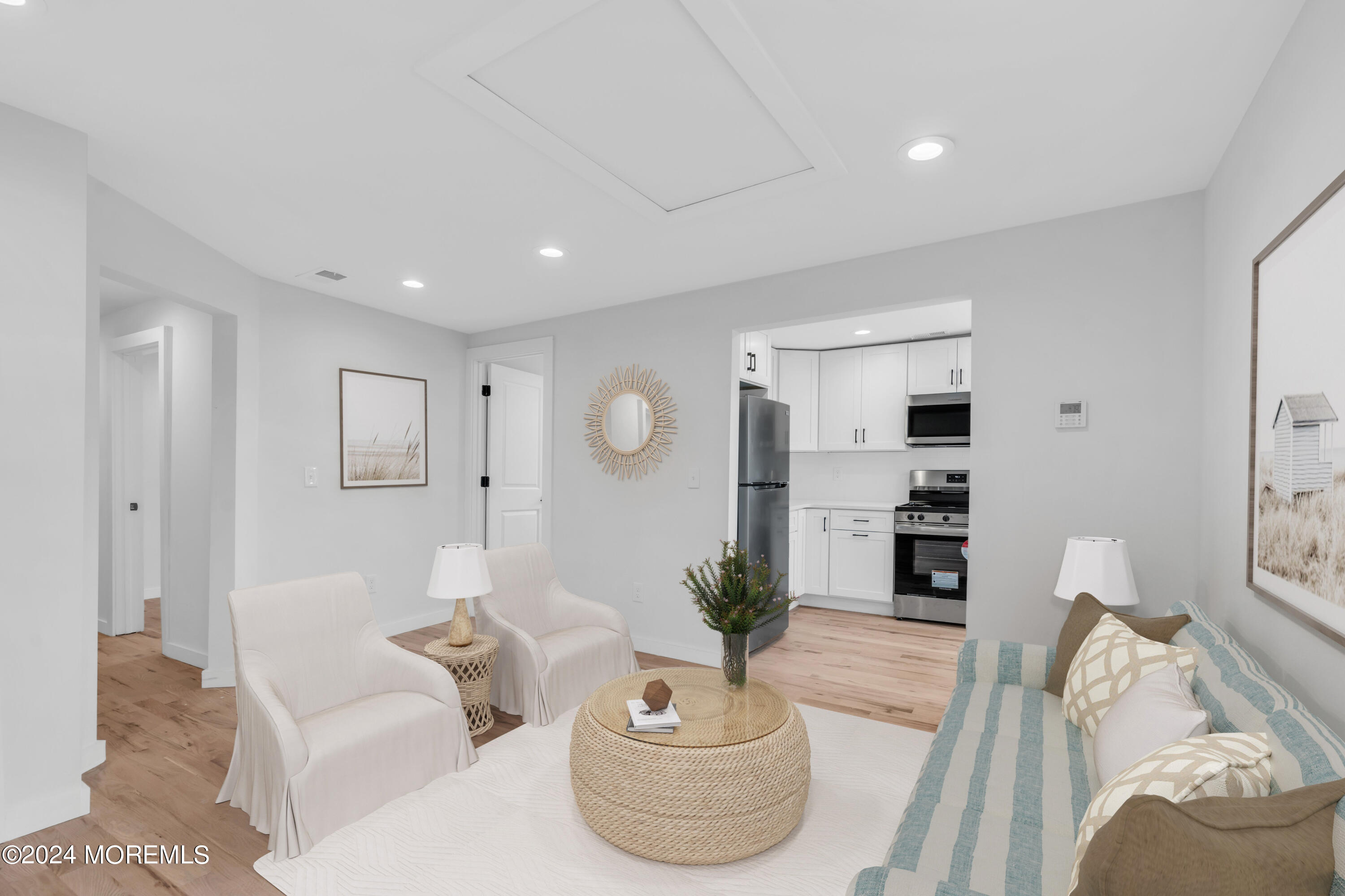 a living room with furniture and a table