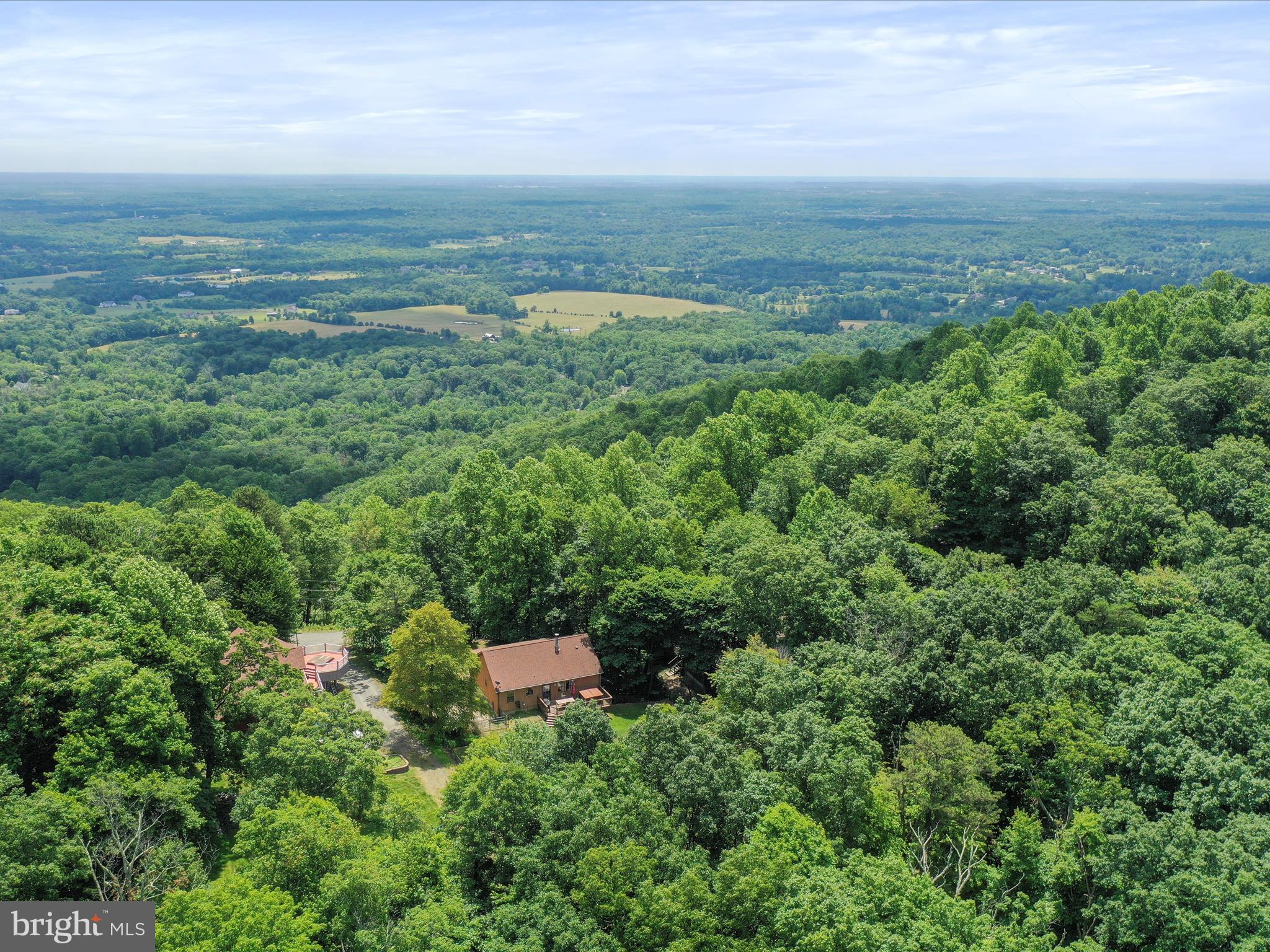 an aerial view of residential house with outdoor space