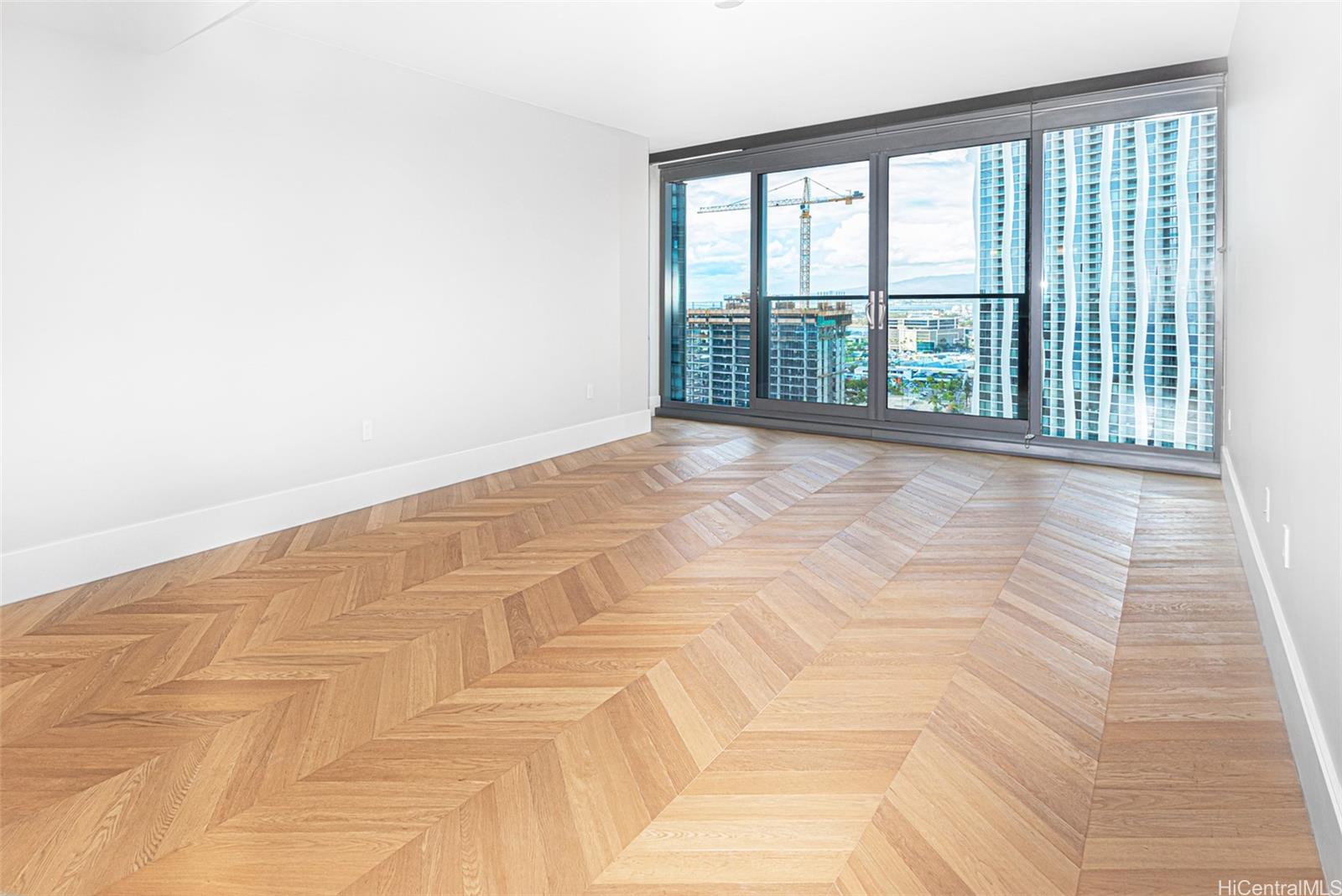 a view of an empty room with a window