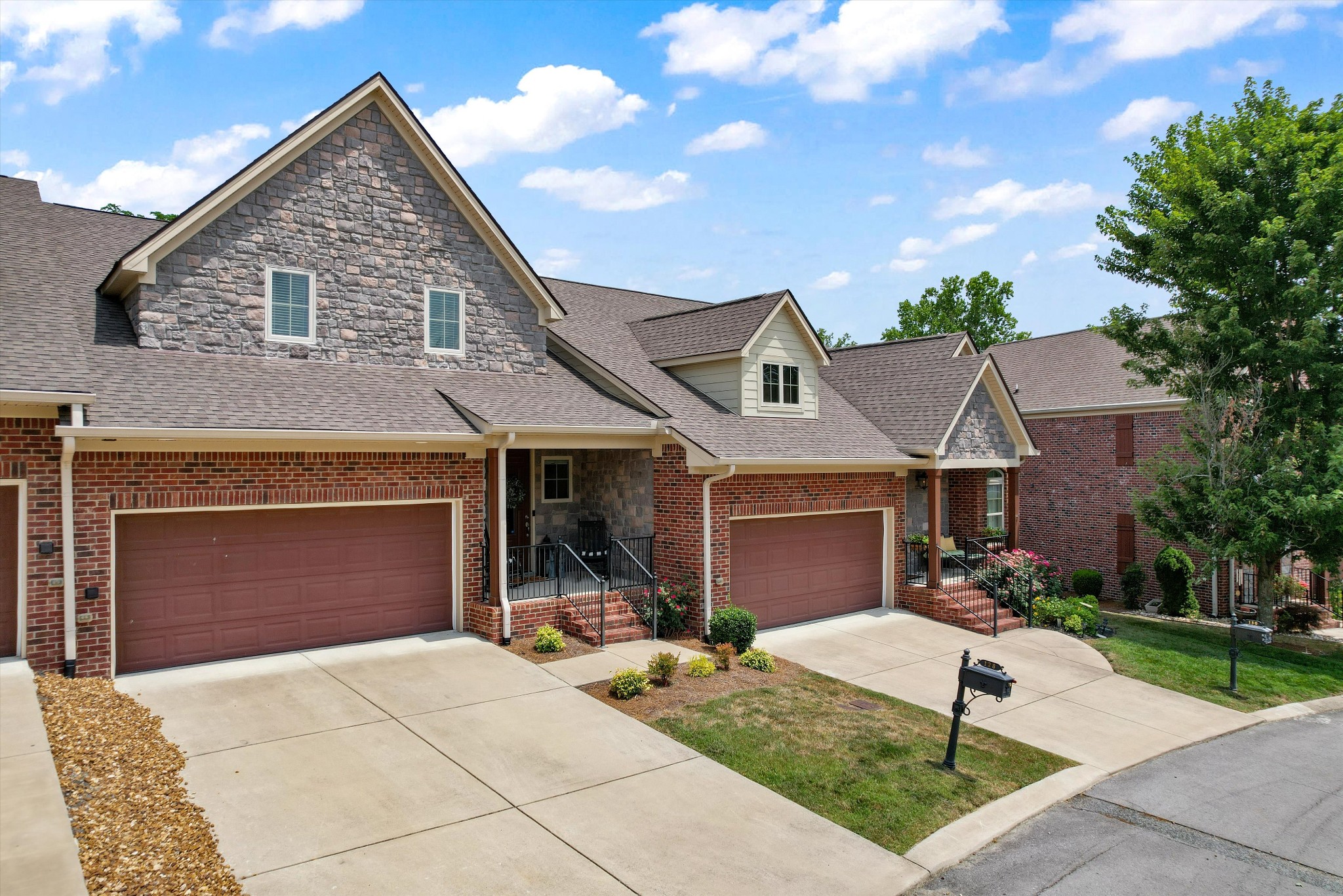 a front view of house with yard outdoor seating and barbeque oven