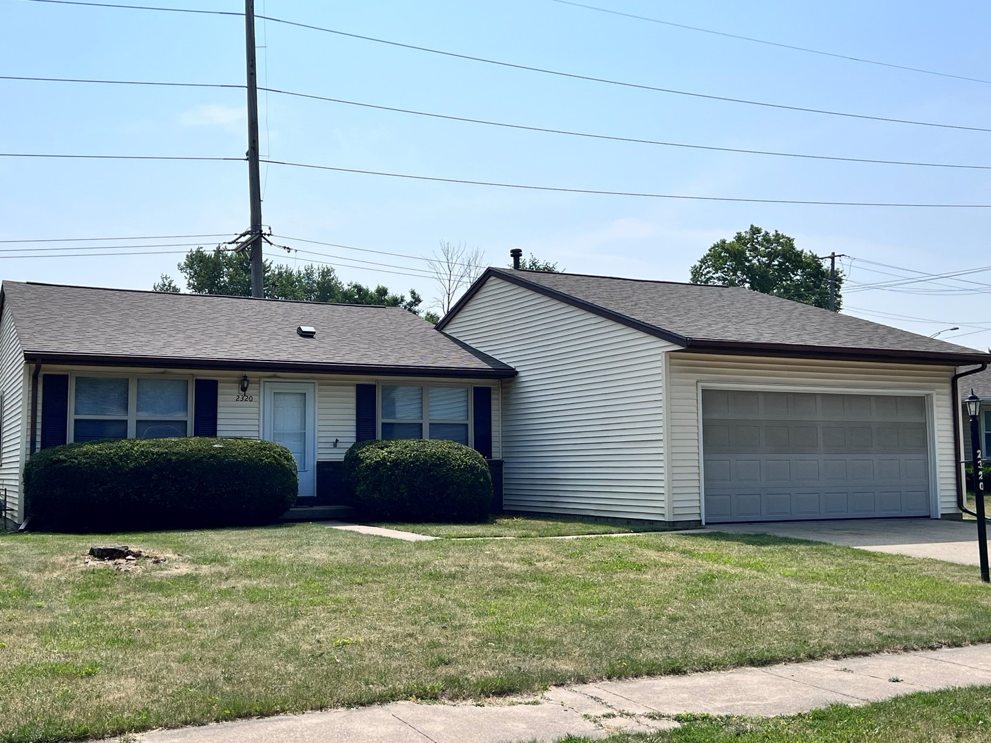 a view of a house with a garden