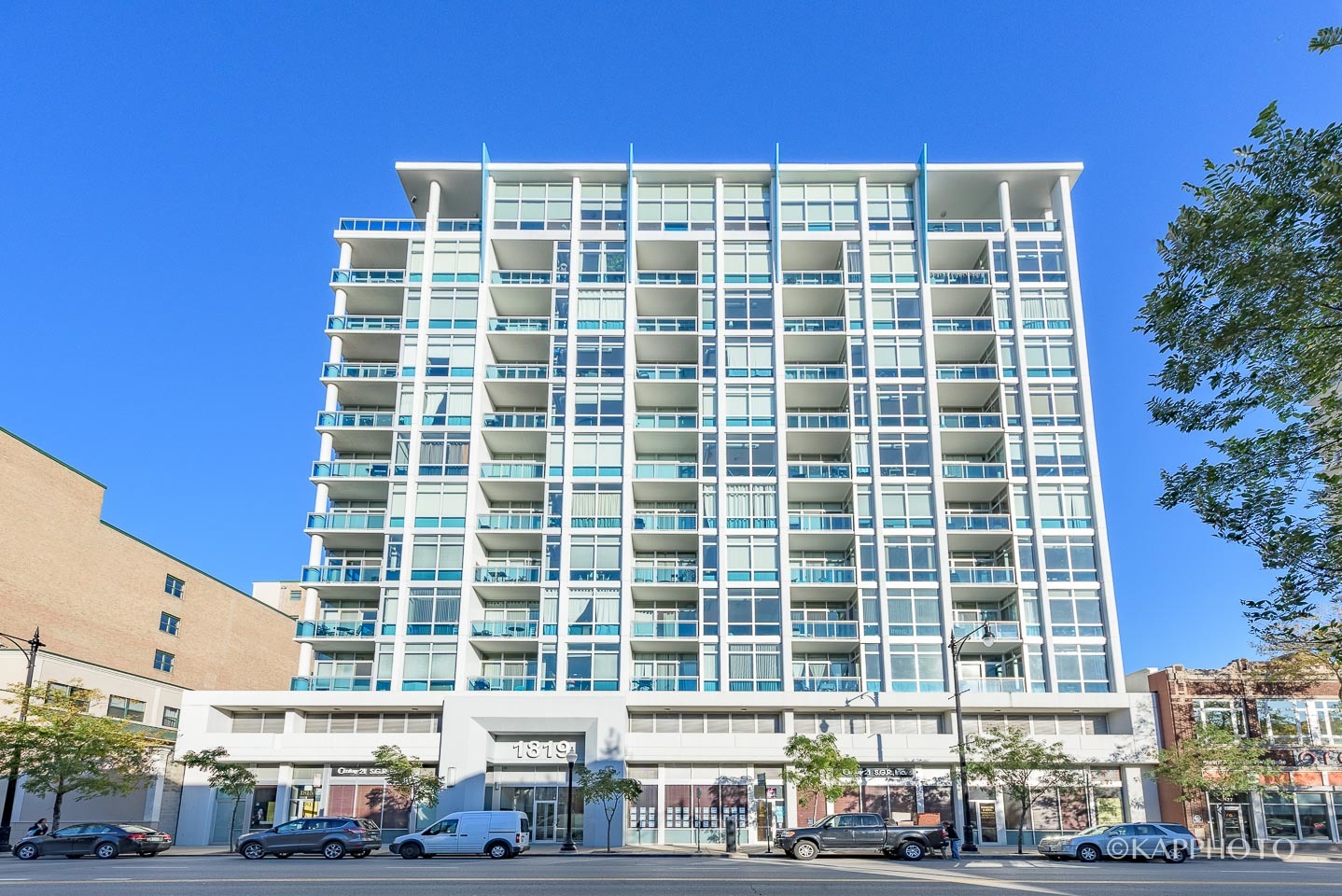 a front view of a building with a street