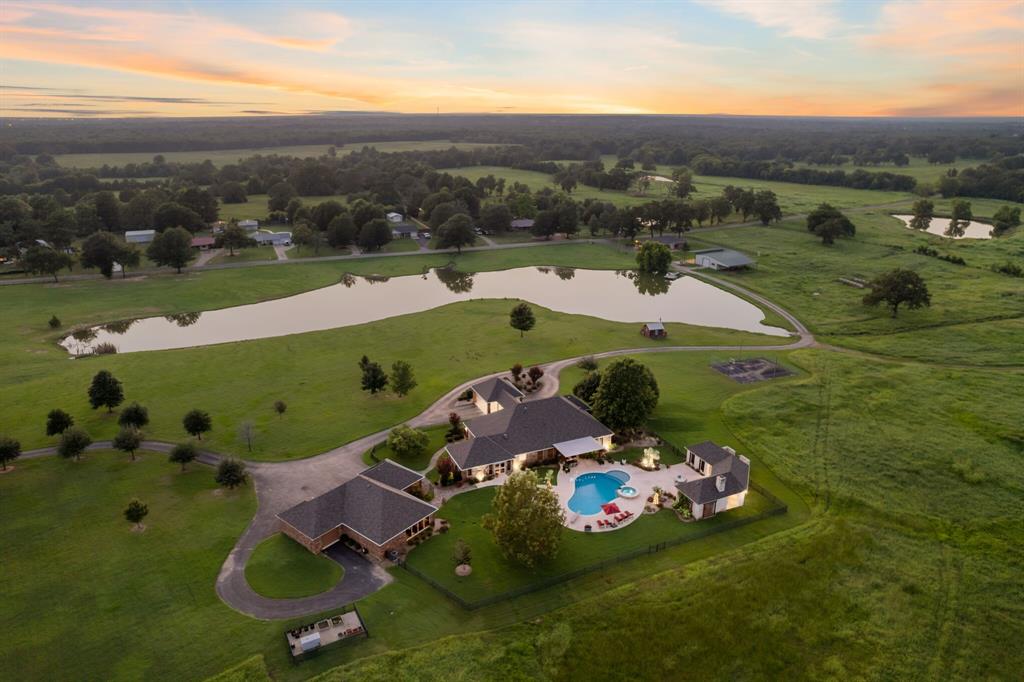 an aerial view of a house with garden