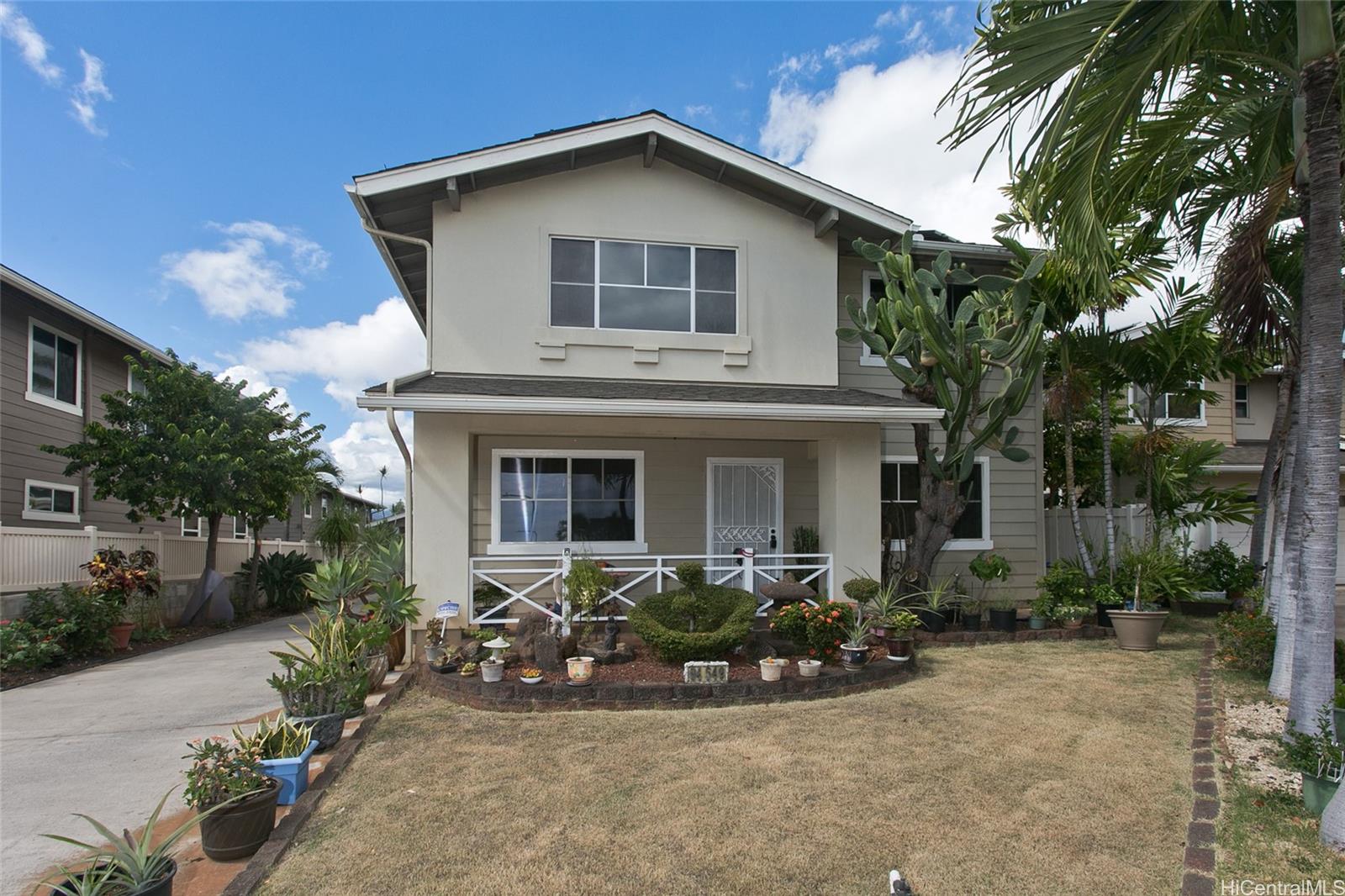 a front view of a house with yard