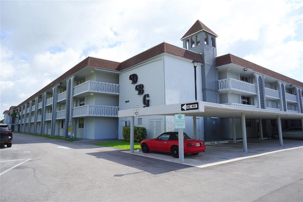 a front view of a building with retail shops