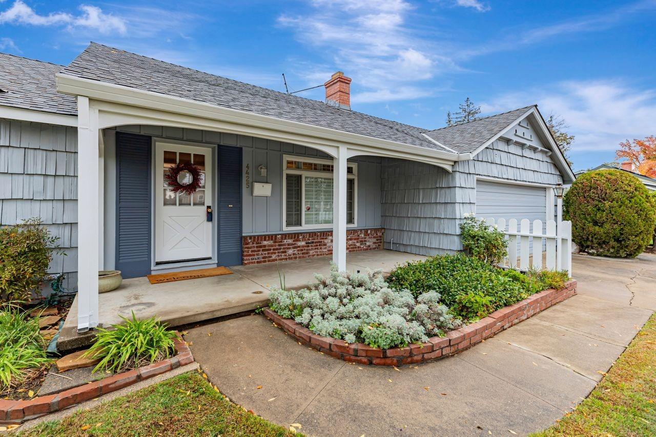 Here are some of the Randy Parks trademarks:  The cottage door with shutters alongside, the little bird house detail above the garage, and the rough sawn shakes.  The roof and exterior paint are newer.  The HVAC is recent too!