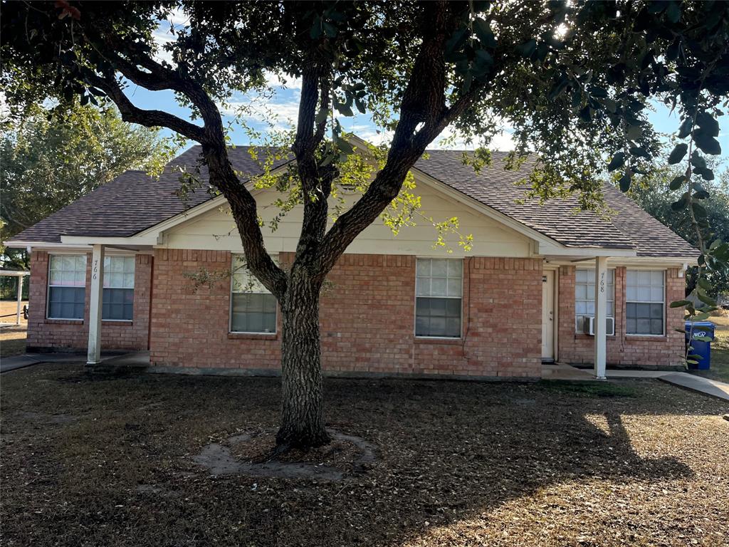 Front view of the home. Beautifully shaded!