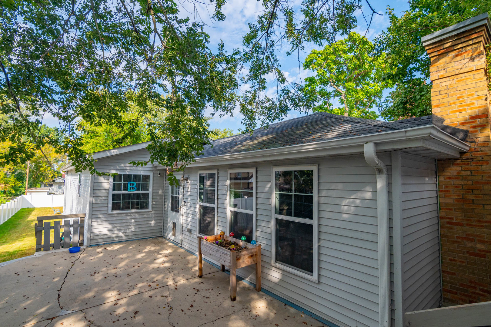 a view of a house with a patio