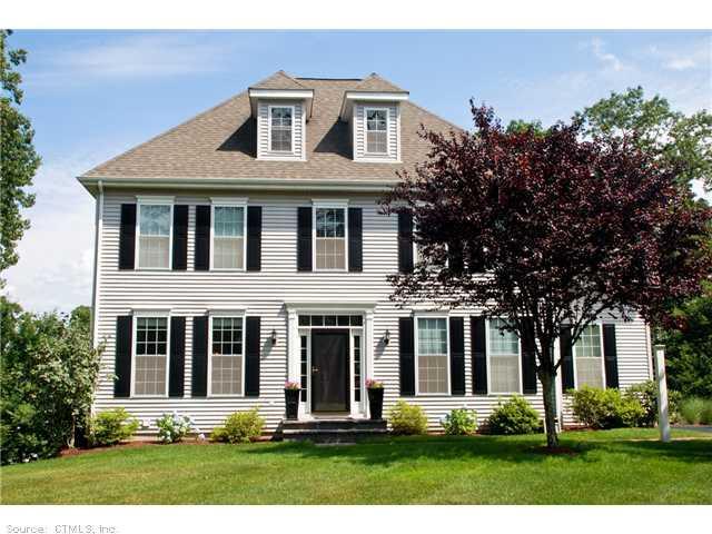 front view of house with a yard