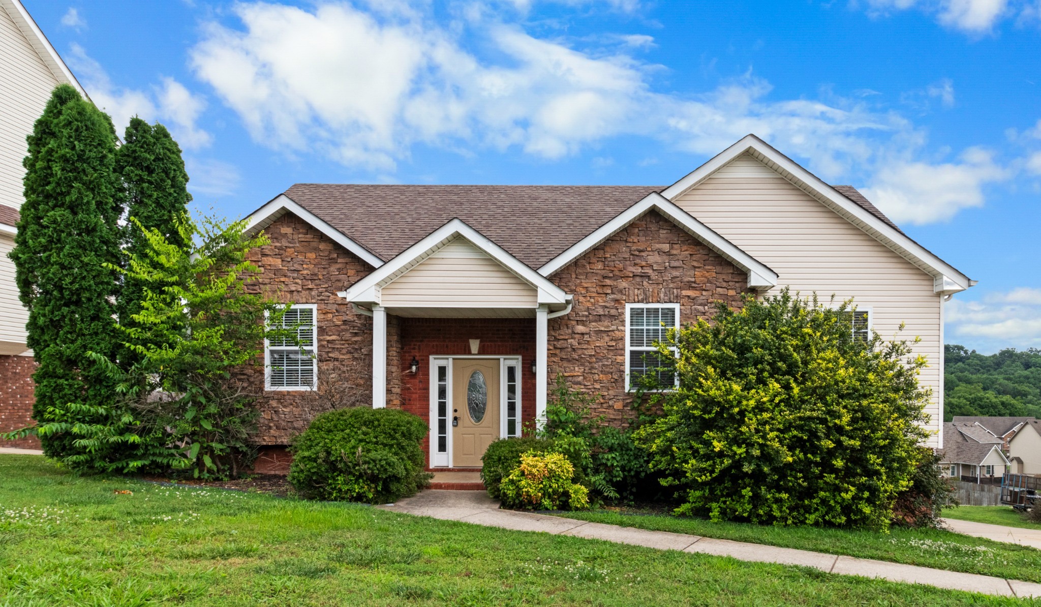 a front view of house with a yard