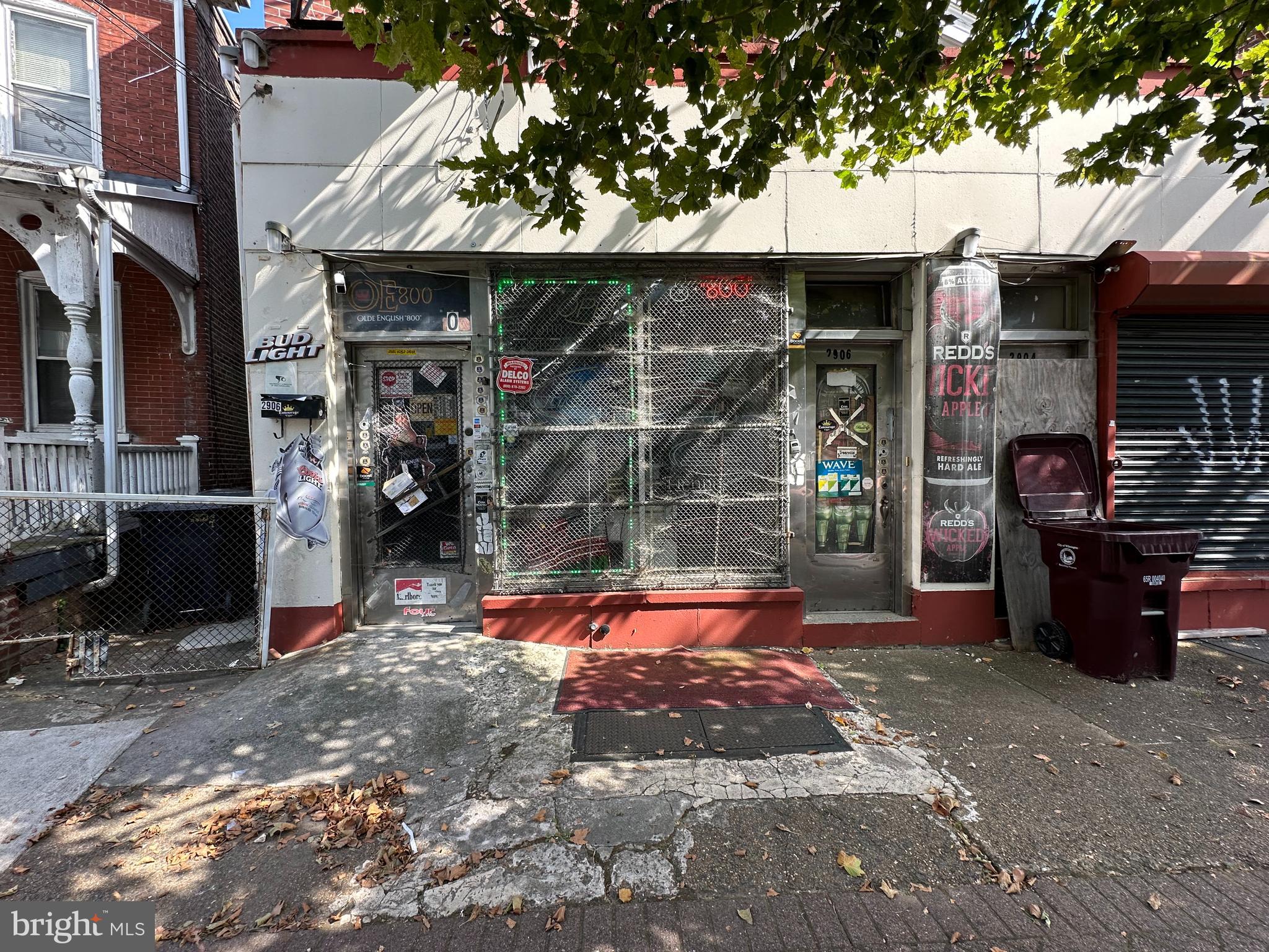 a view of outdoor space shop and tree s