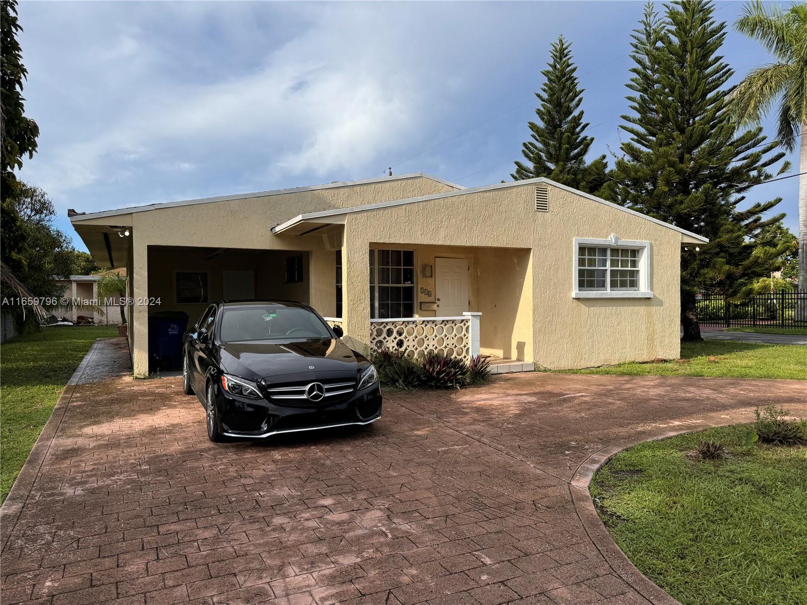 a car parked in front of house