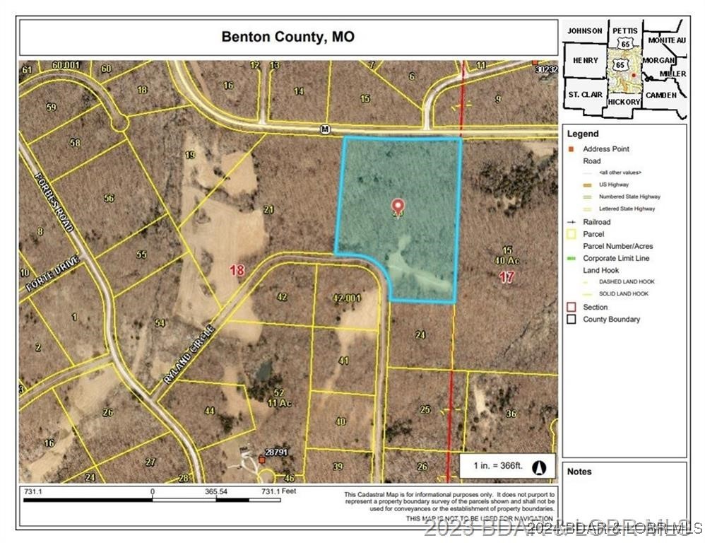 12.6 Acres with 655 feet of road frontage off Hwy