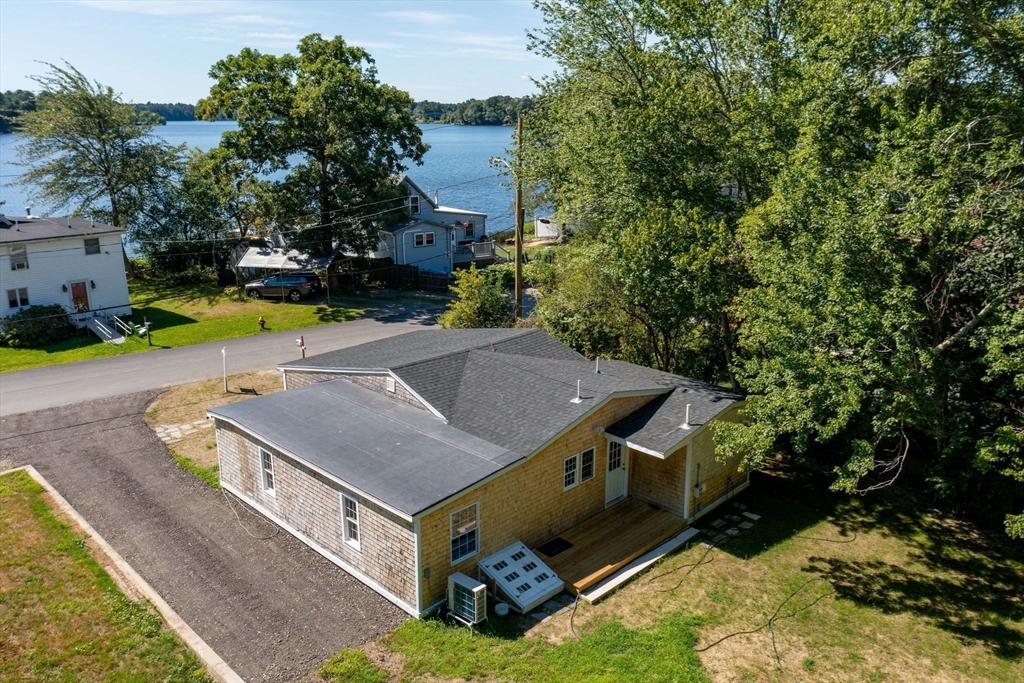 an aerial view of a house having yard