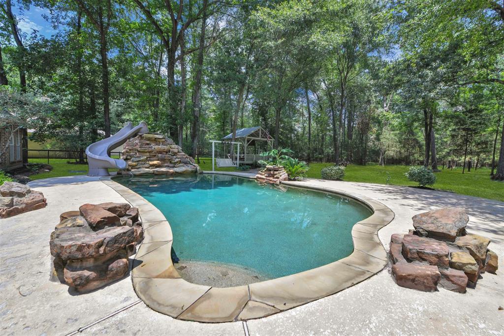 a view of a wooden floor and a fire pit