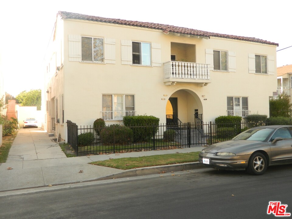 a view of a car parked in front of a house