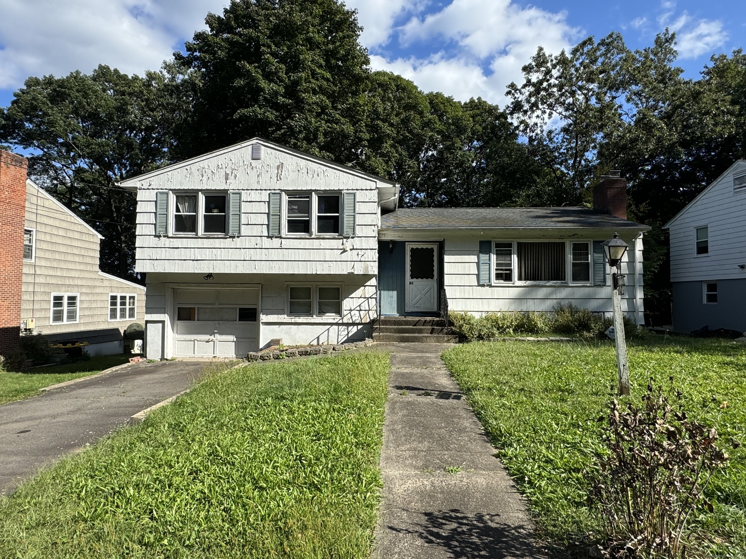 a front view of a house with a patio