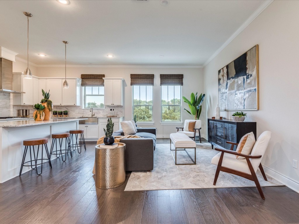 This captivating multi-Level Contemporary Brownstone provides 3,144 sq ft of thoughtfully planned living space with multiple living areas, 3 bedrooms each with private ensuite bathrooms, plus 2 half bathrooms.