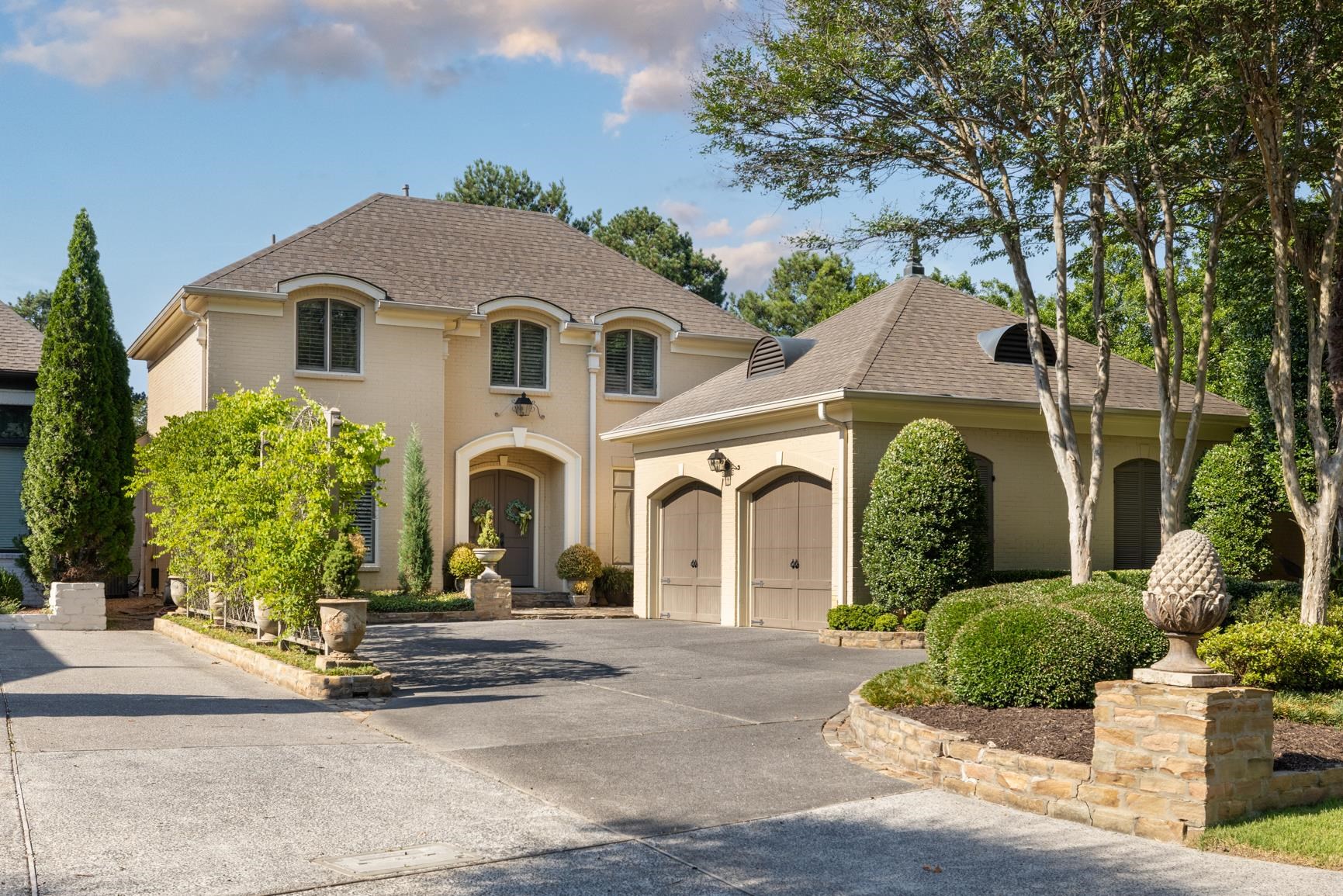 a front view of a house with yard