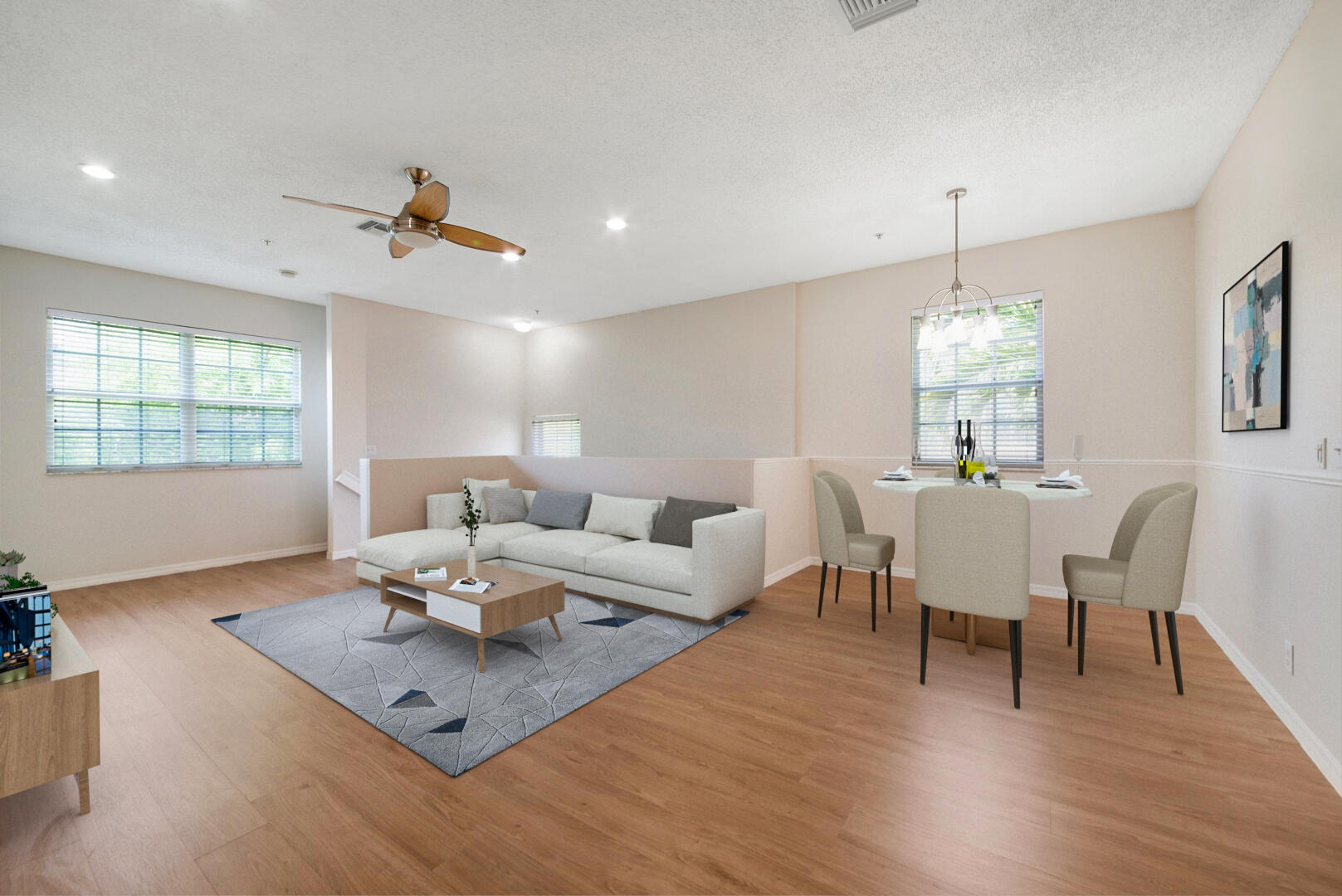 a living room with furniture a window and a chandelier