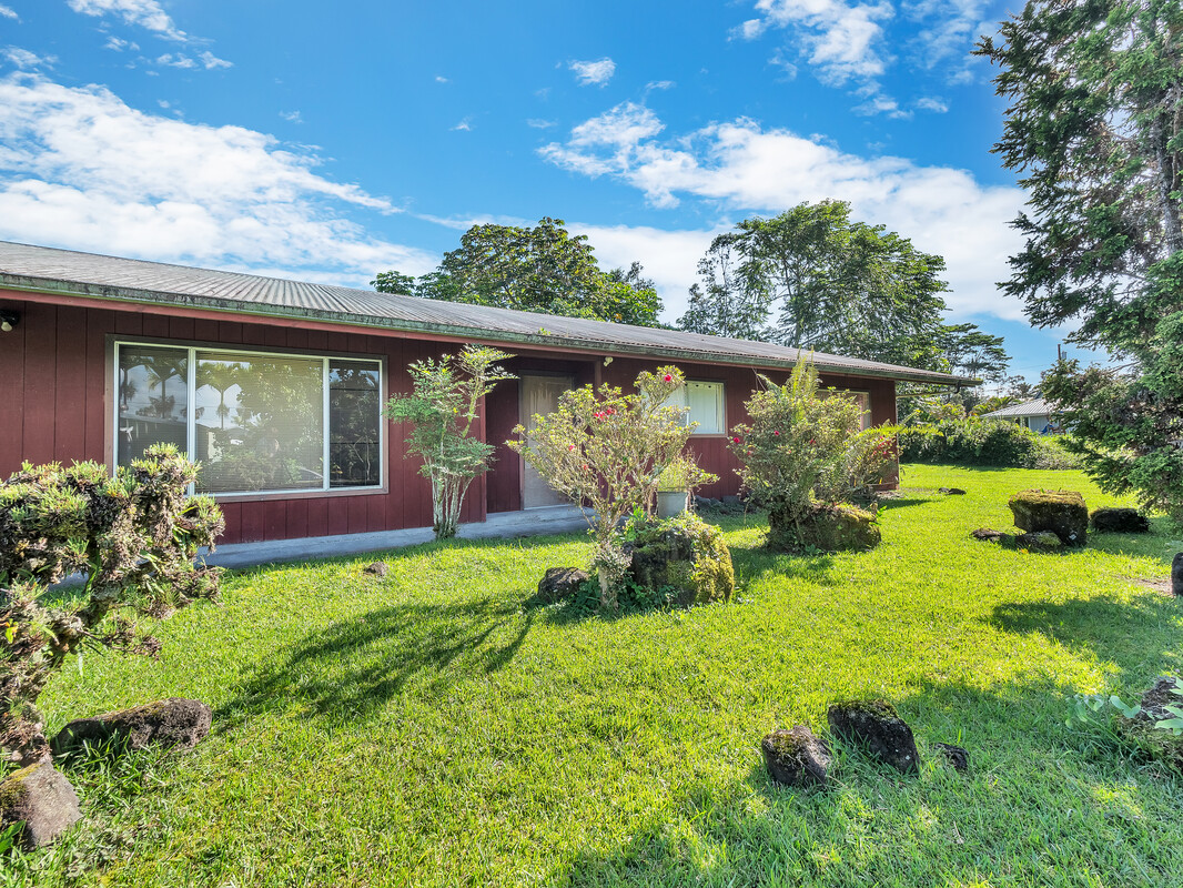 Mature landscaping.  Great Bones.  Newer homes in the area.  Paved road.