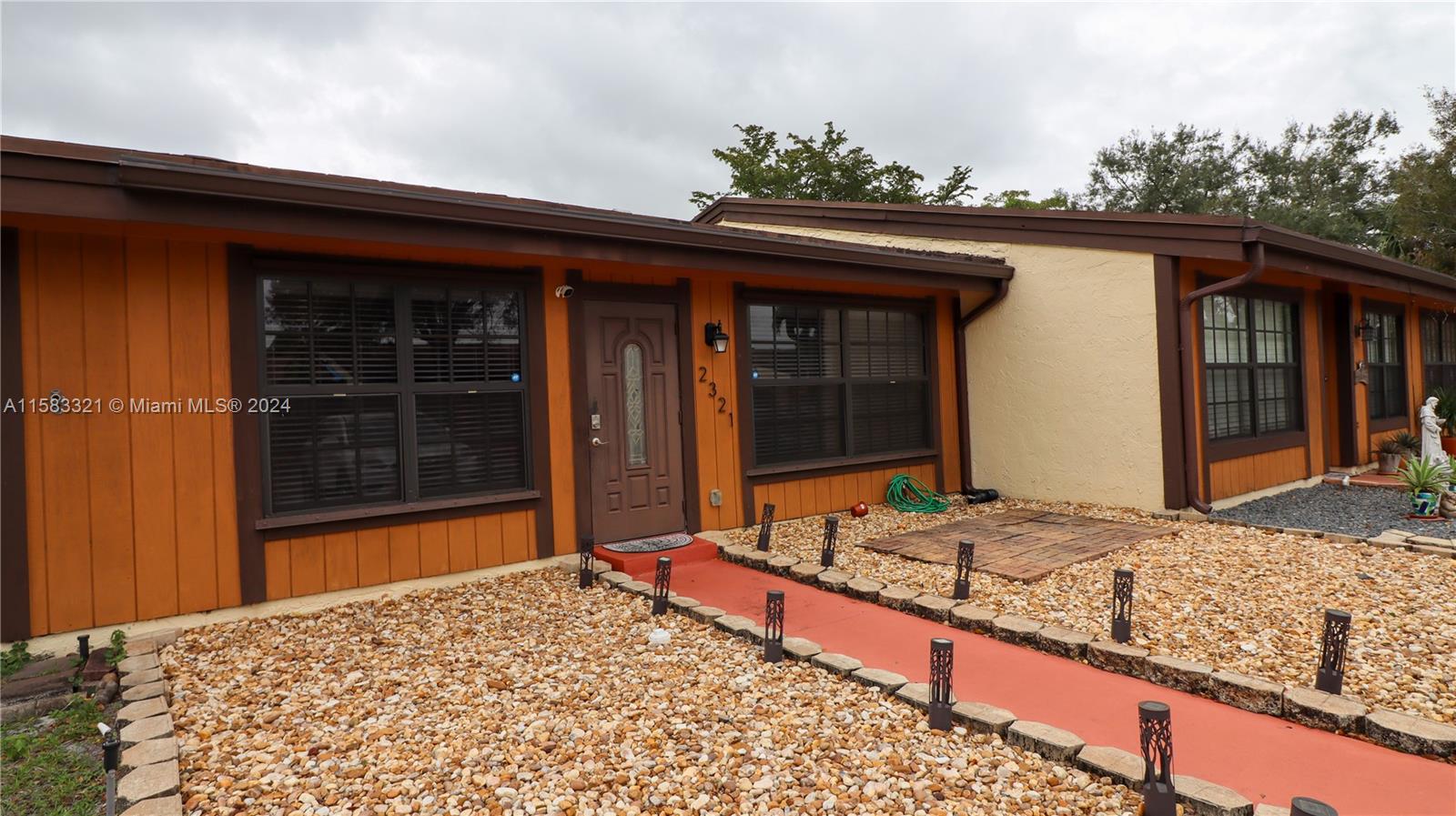 a view of a backyard of a house