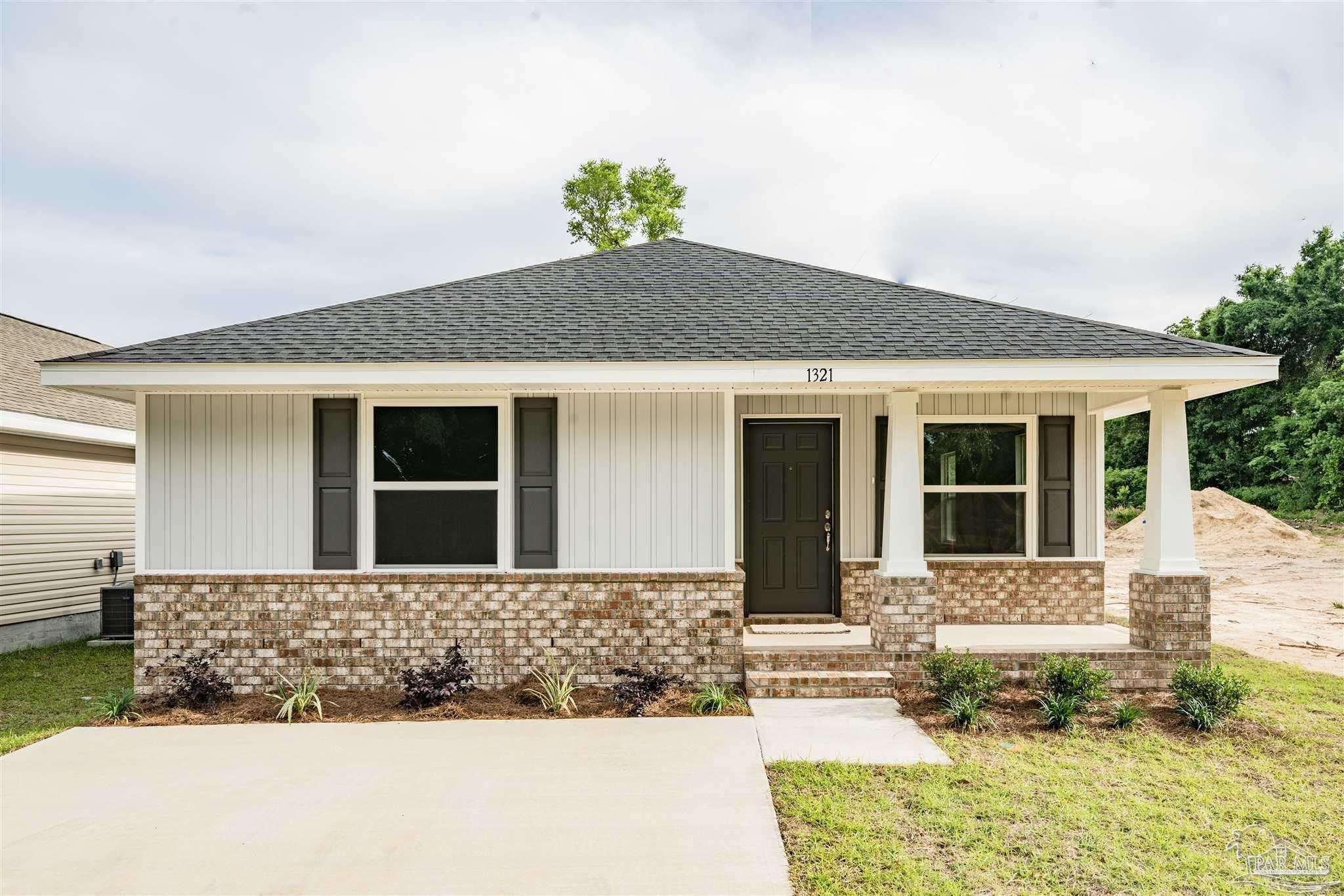 a front view of a house with a porch