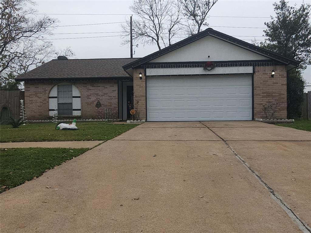 a view of a house with a street