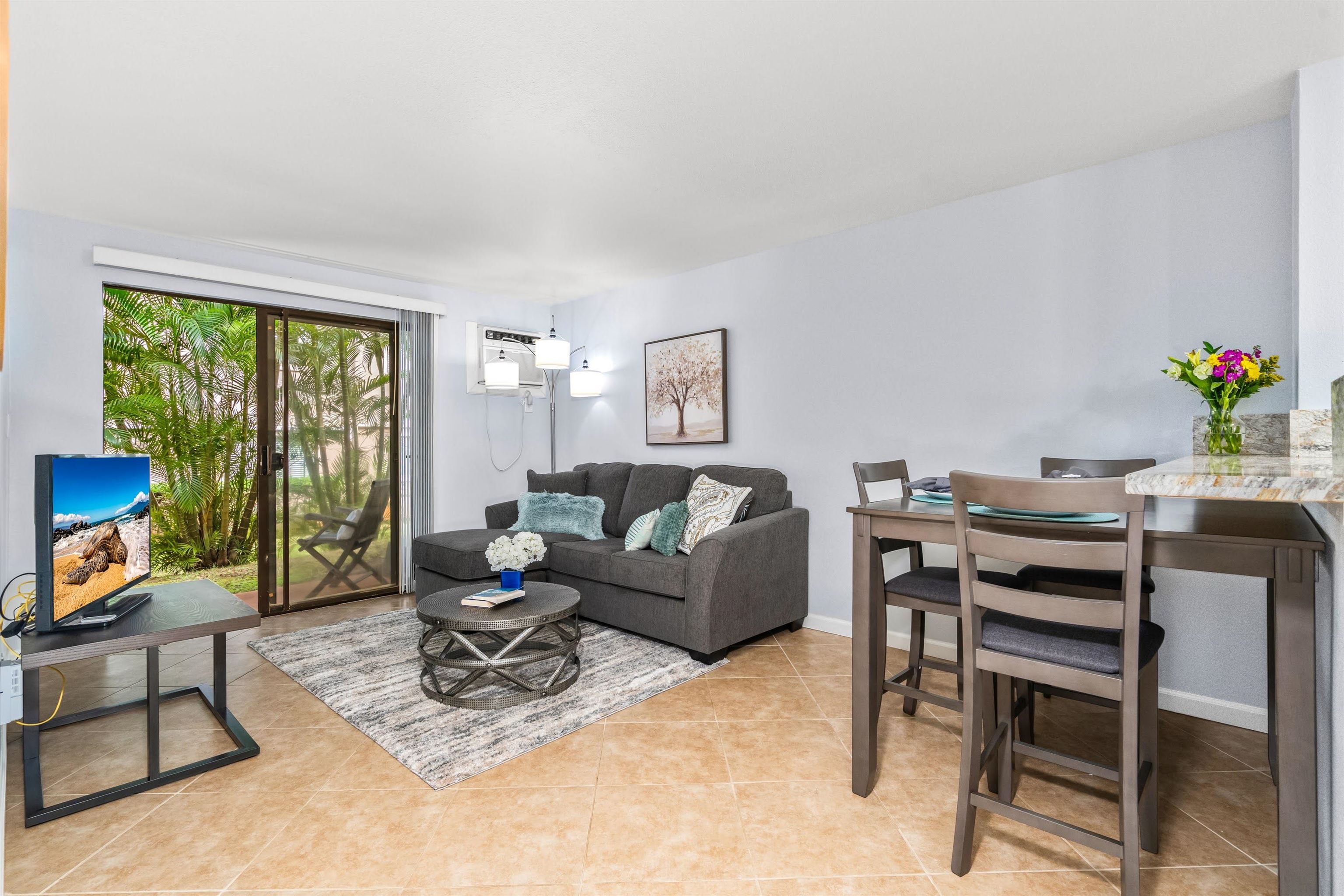 a living room with furniture and a window