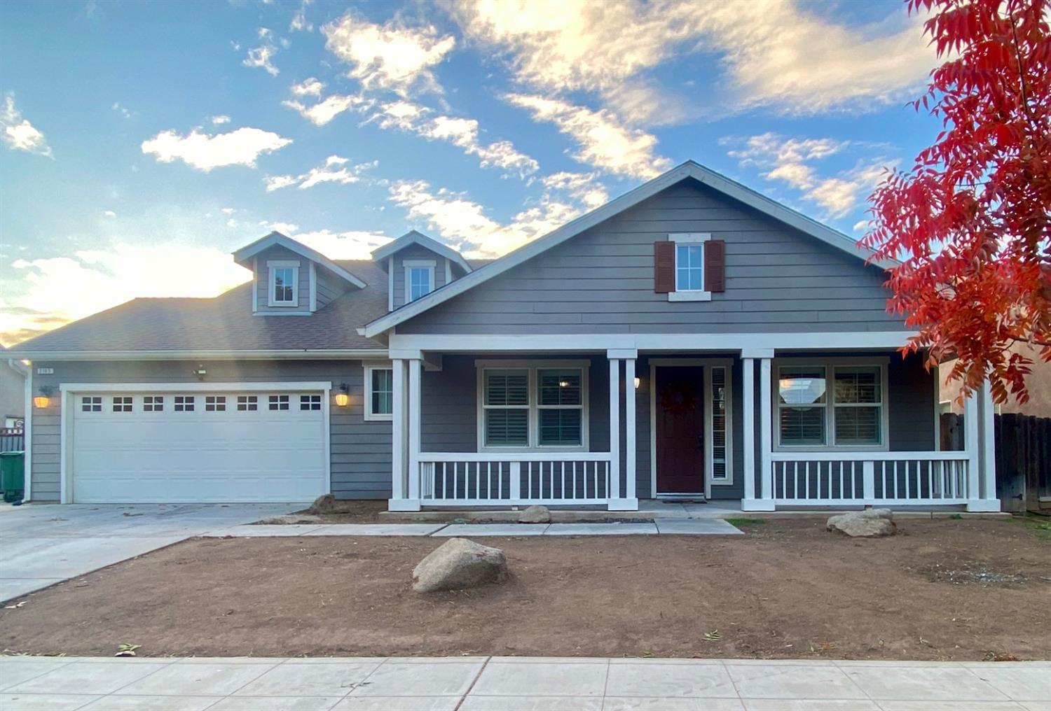 a view of a house with a garage