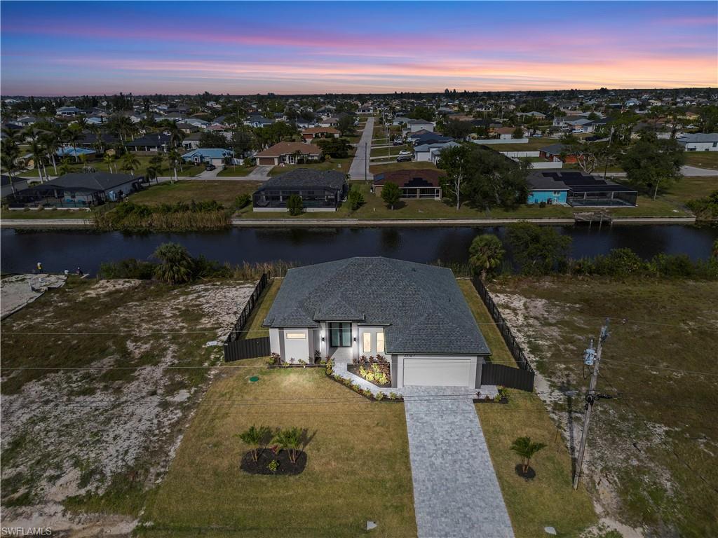 Aerial view at dusk with a water view