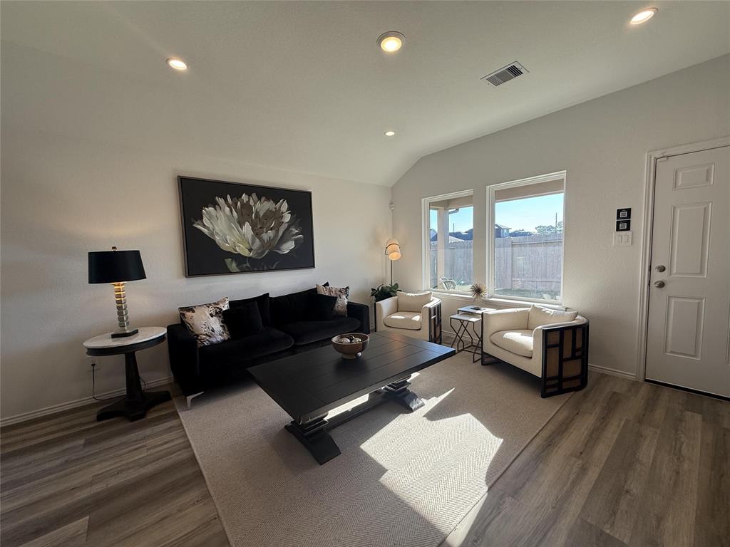 WELCOME!!!  inviting living room with large windows, stylish finishes.