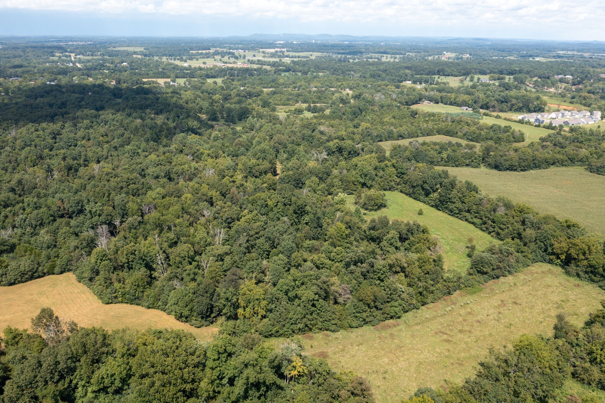 an aerial view of mountain with residential space