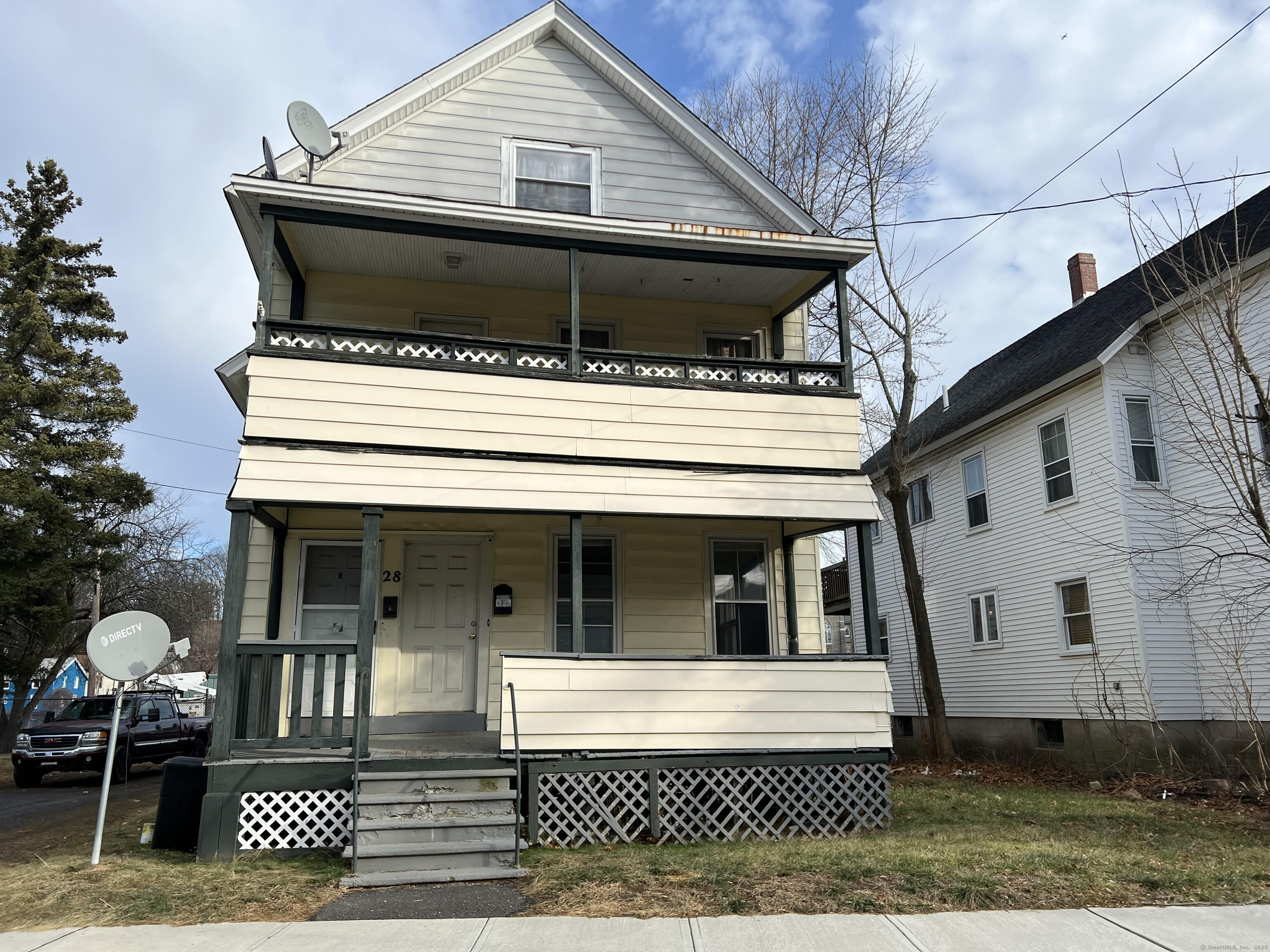 a view of house with outdoor space