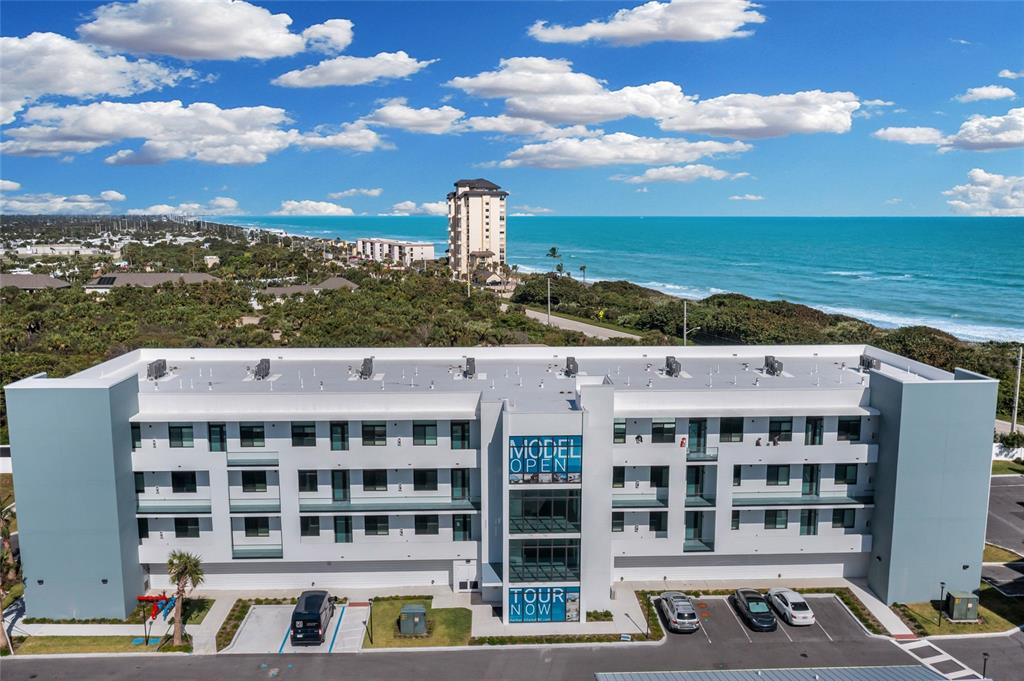 a view of a building with a ocean view