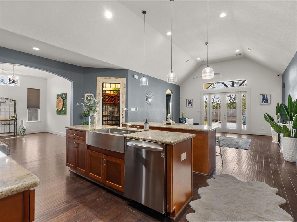 a large kitchen that has a lot of cabinets in it