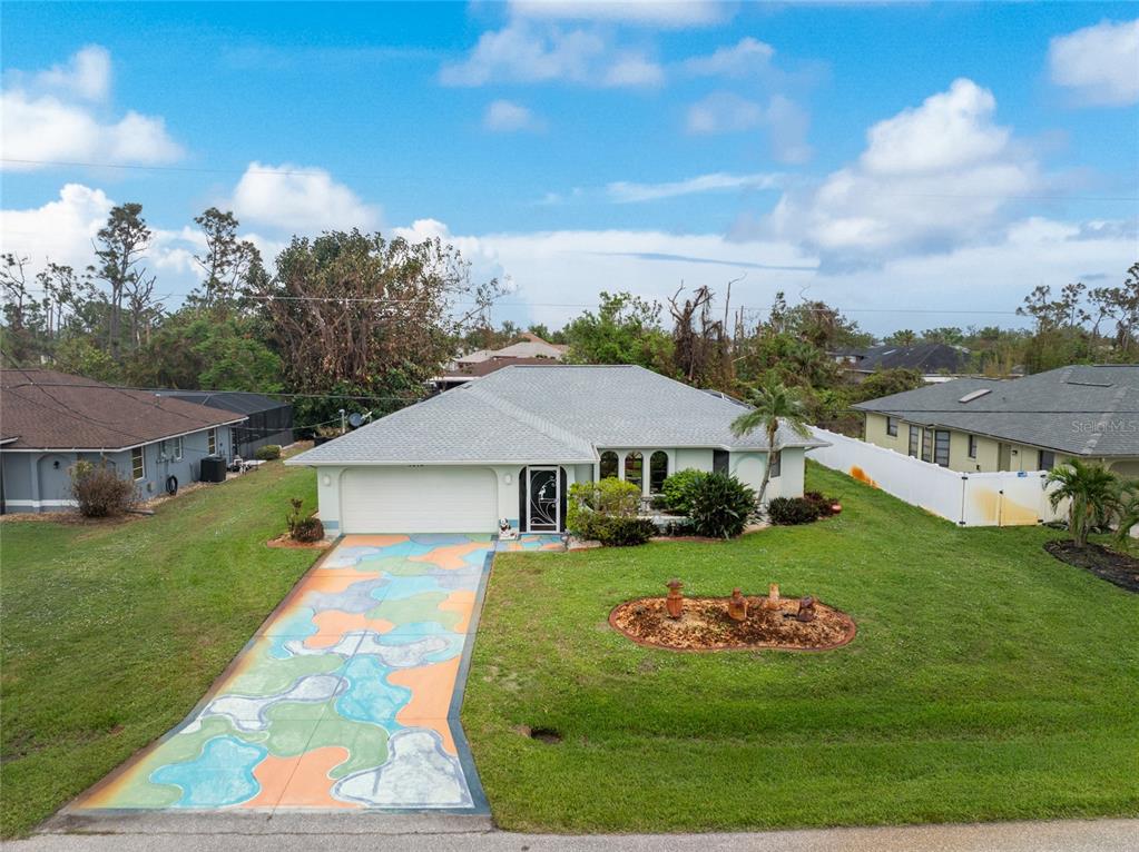 a view of a house with a big yard