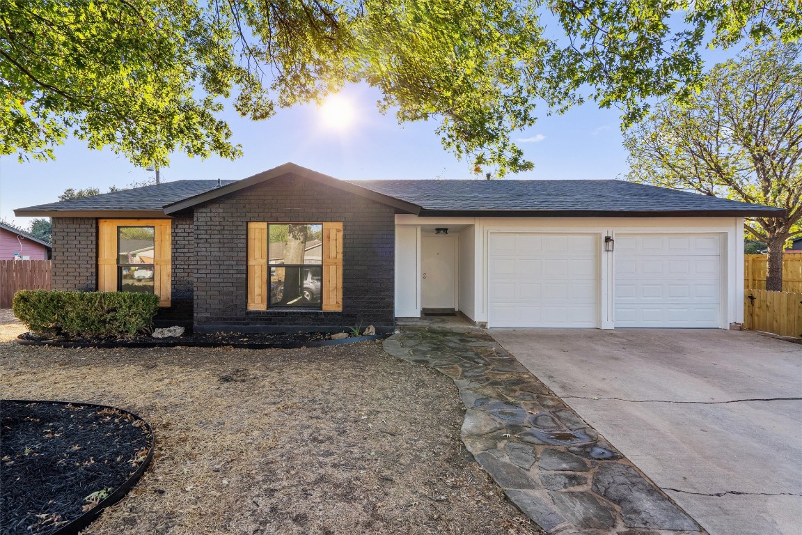 Located in the heart of Round Rock, this beautifully updated home, situated on a corner lot, blends modern aesthetics with practical design.