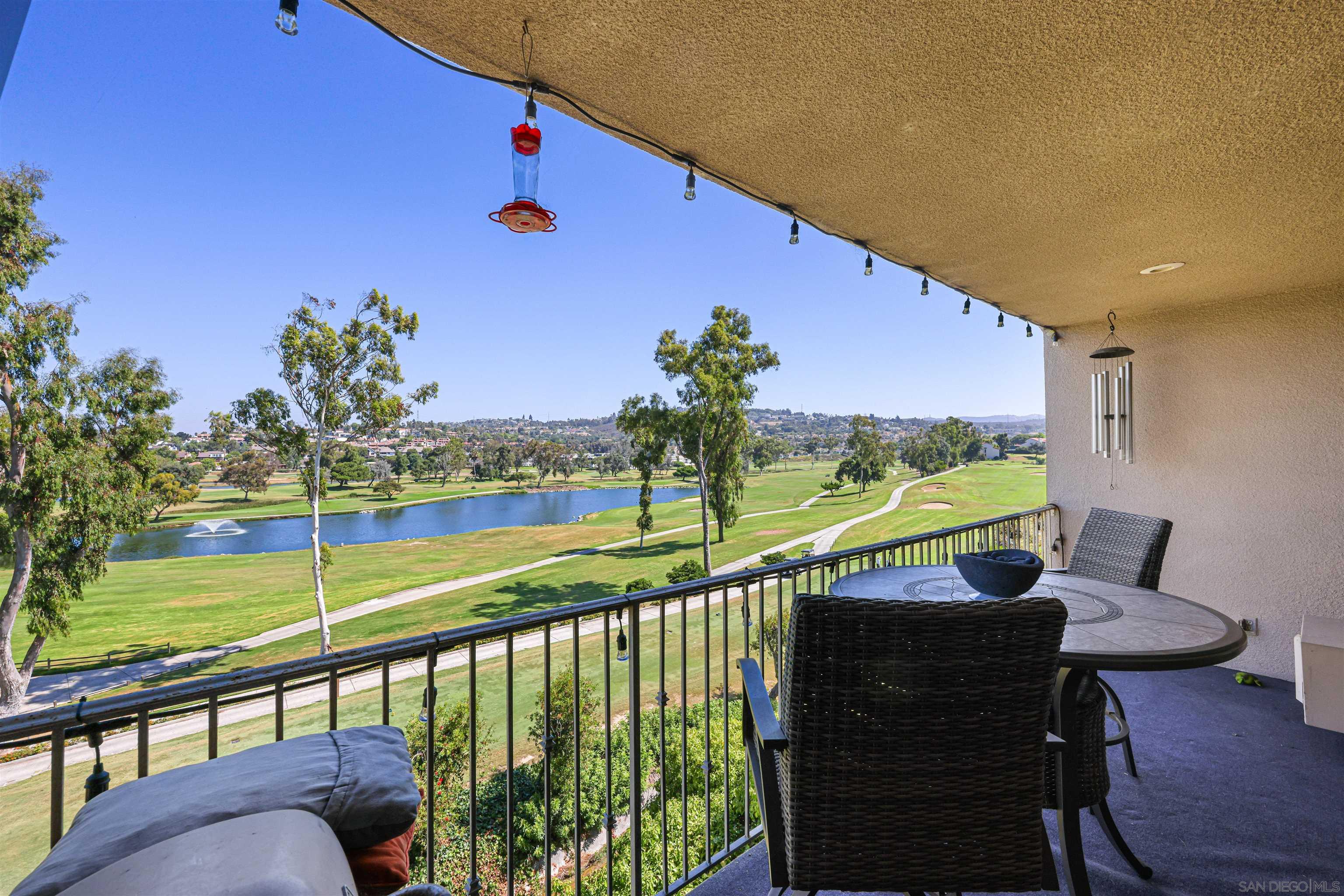 a view of swimming pool from a balcony