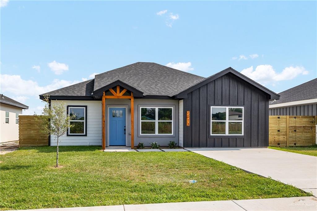 front view of a house with a yard