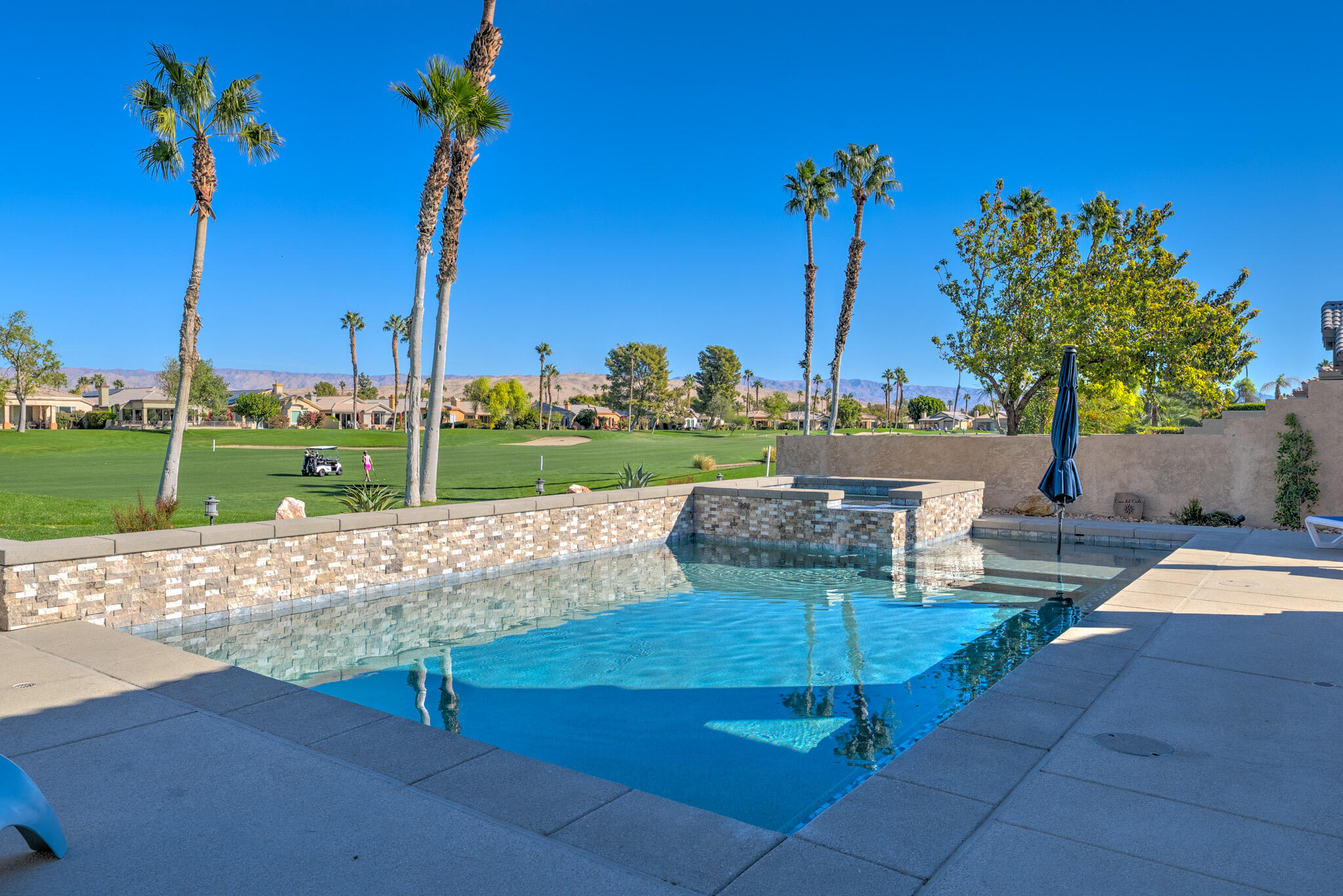 a view of a backyard with a bench