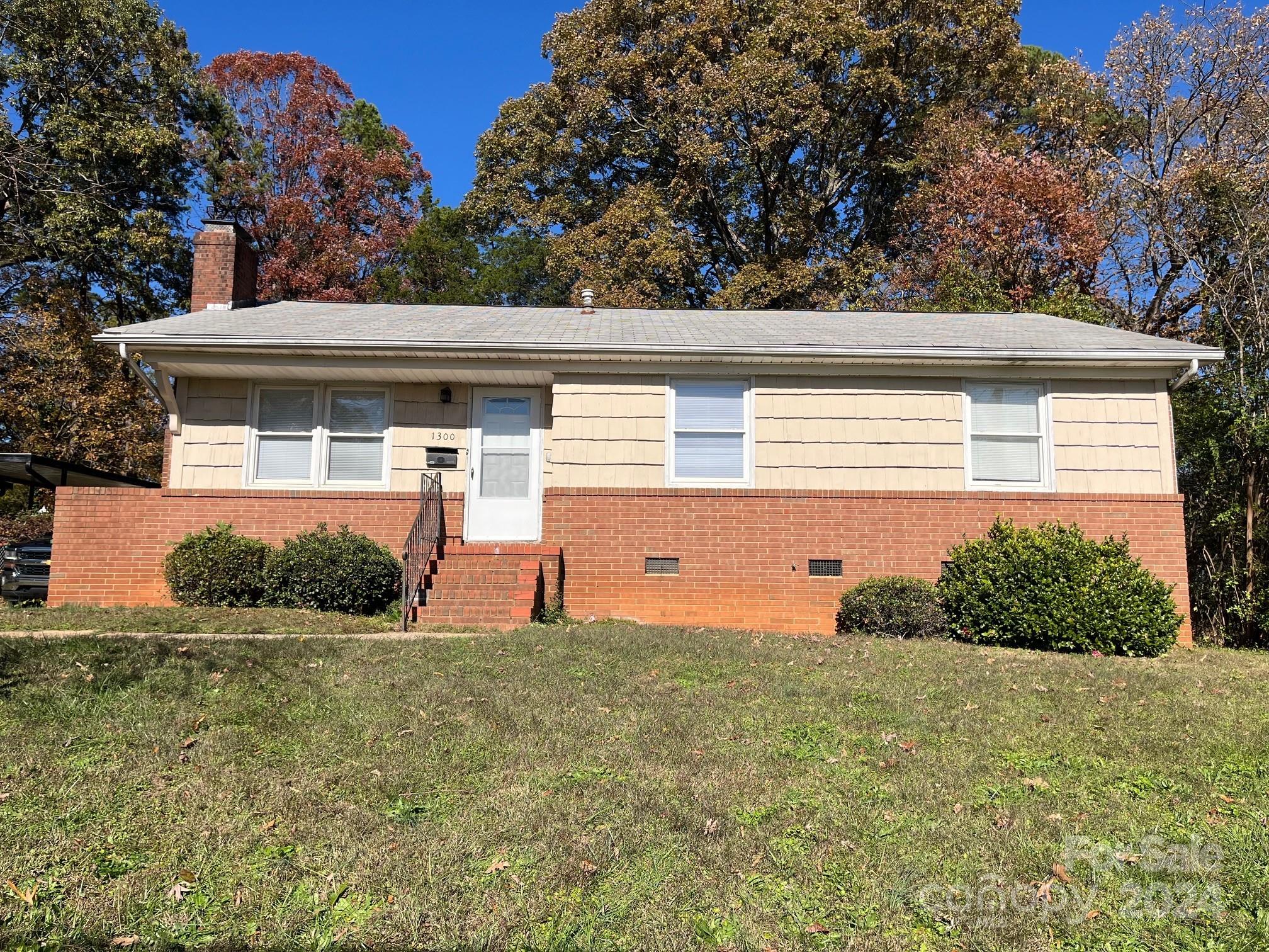 a front view of house with yard