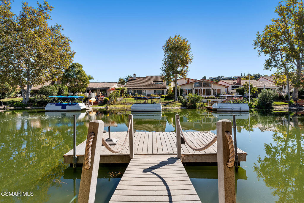 a lake view with a seating space and water view