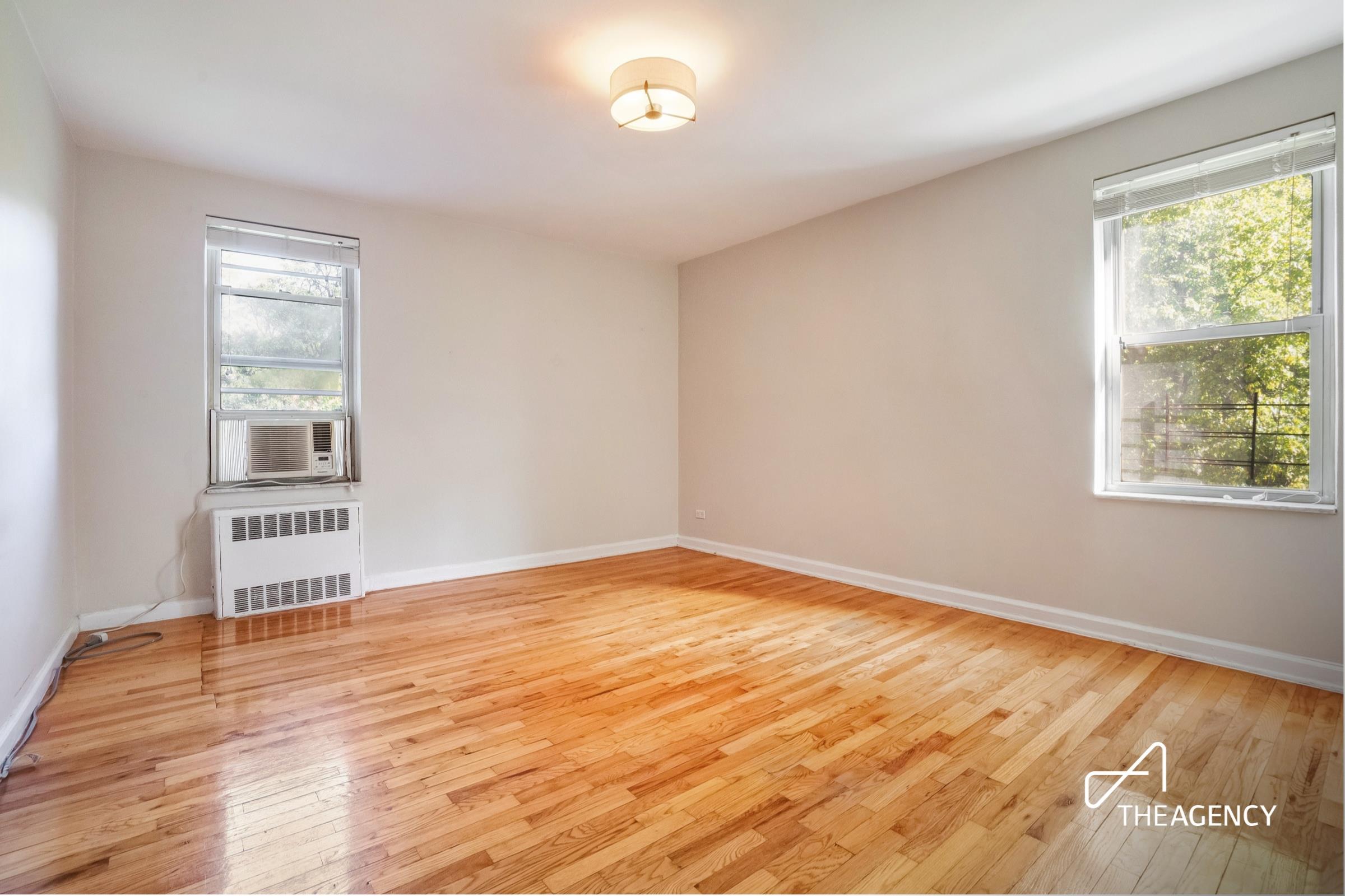 a view of an empty room and window