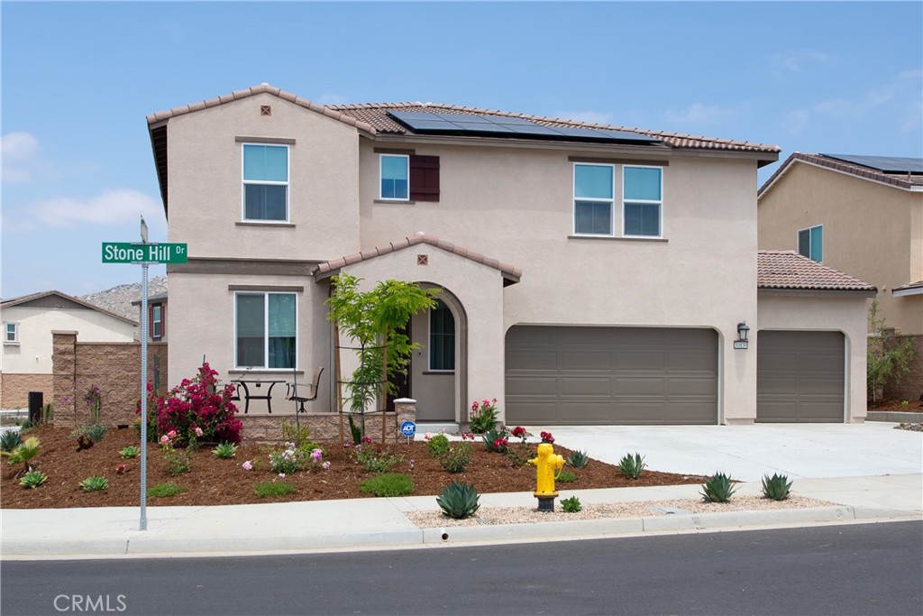 a front view of house with street